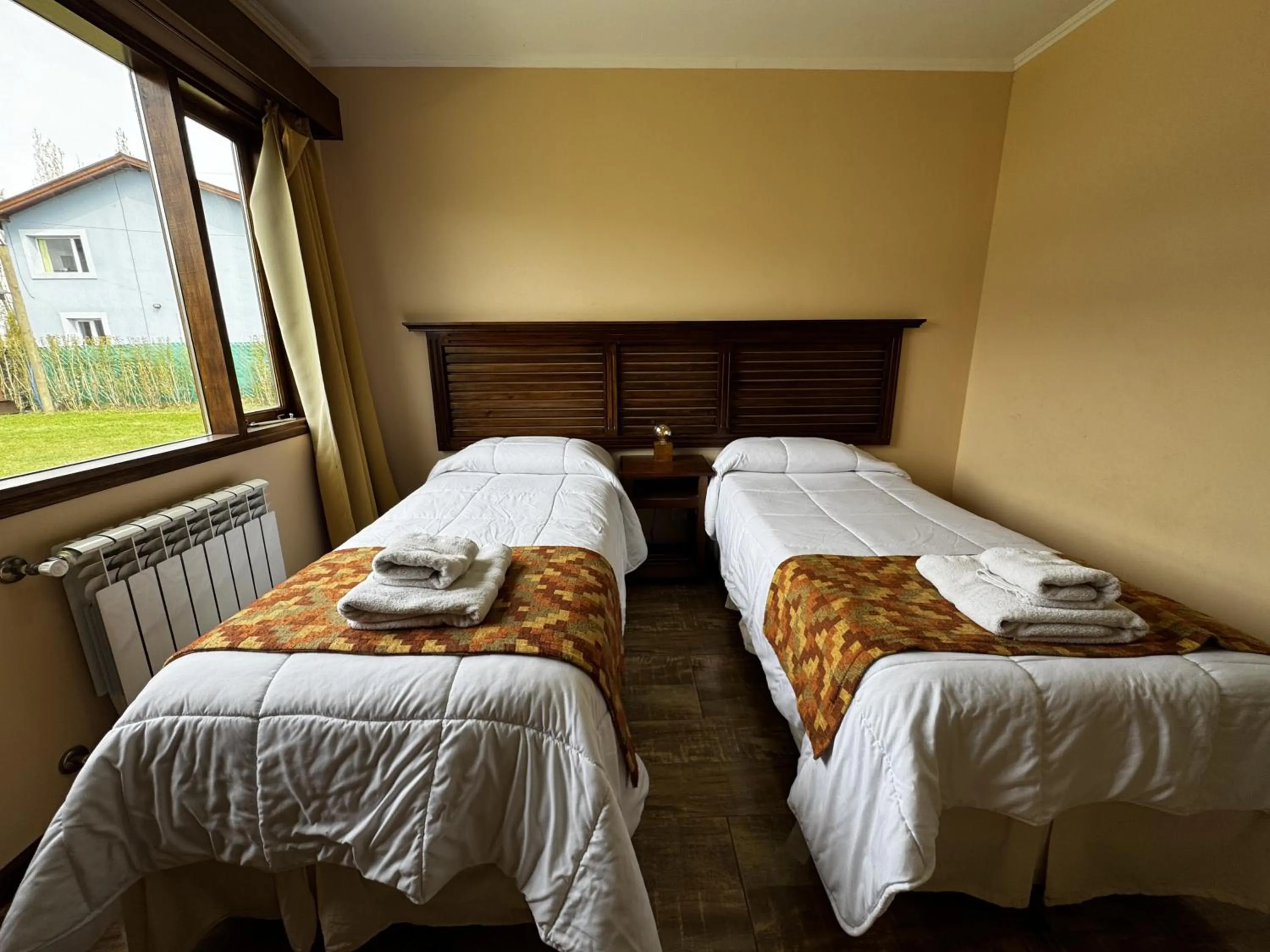Photo of the whole room, Bed in Patagonia Austral Suites