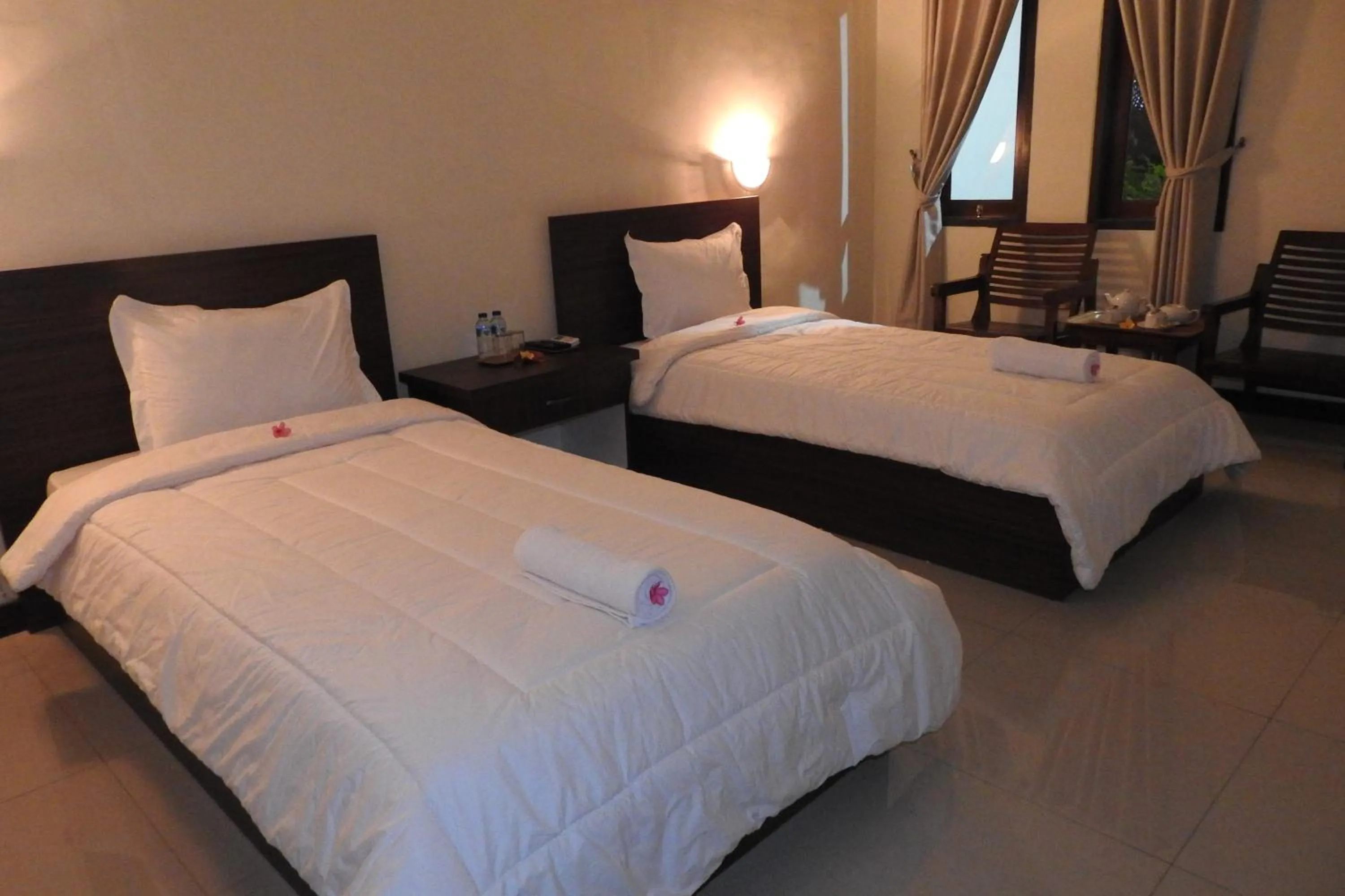 Bed in D'Batur Hotel