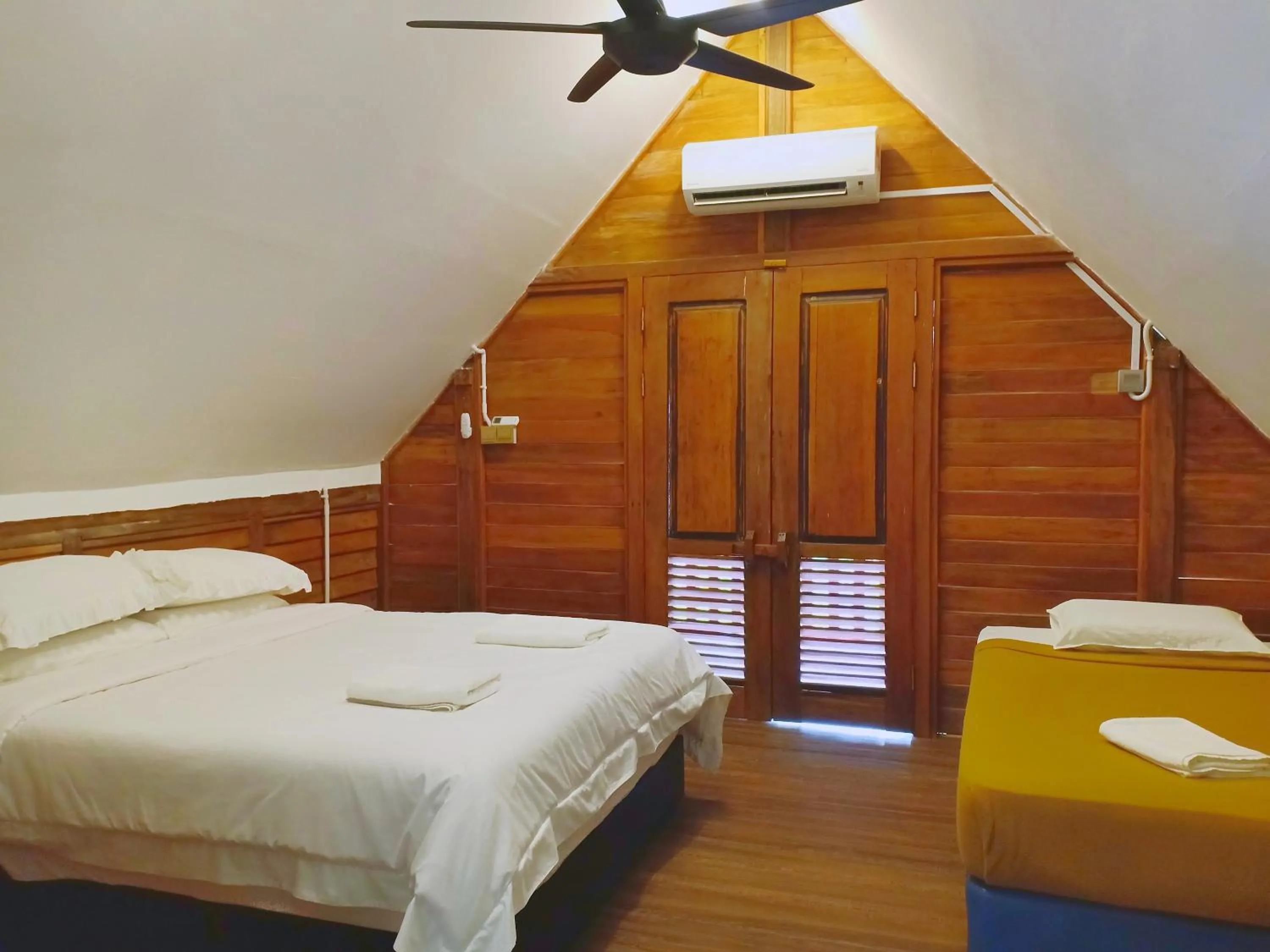 Bed in Bayu Lestari Island Resort