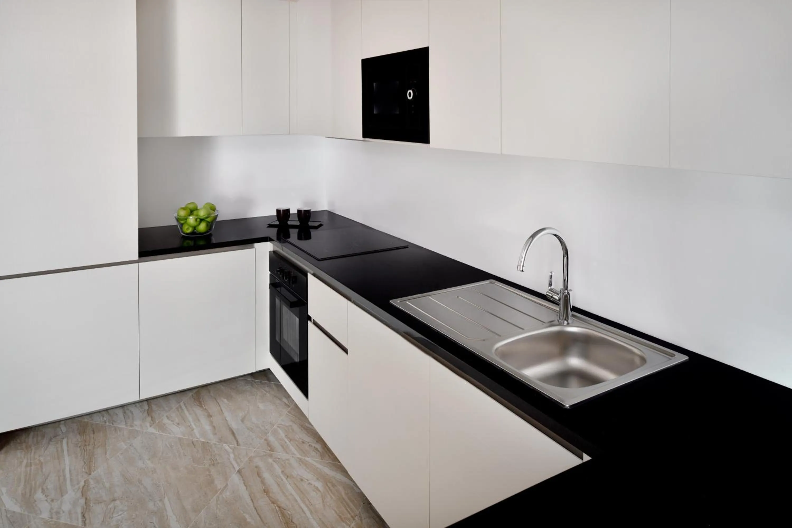 Kitchen or kitchenette in Mövenpick Hotel Apartments Downtown Dubai