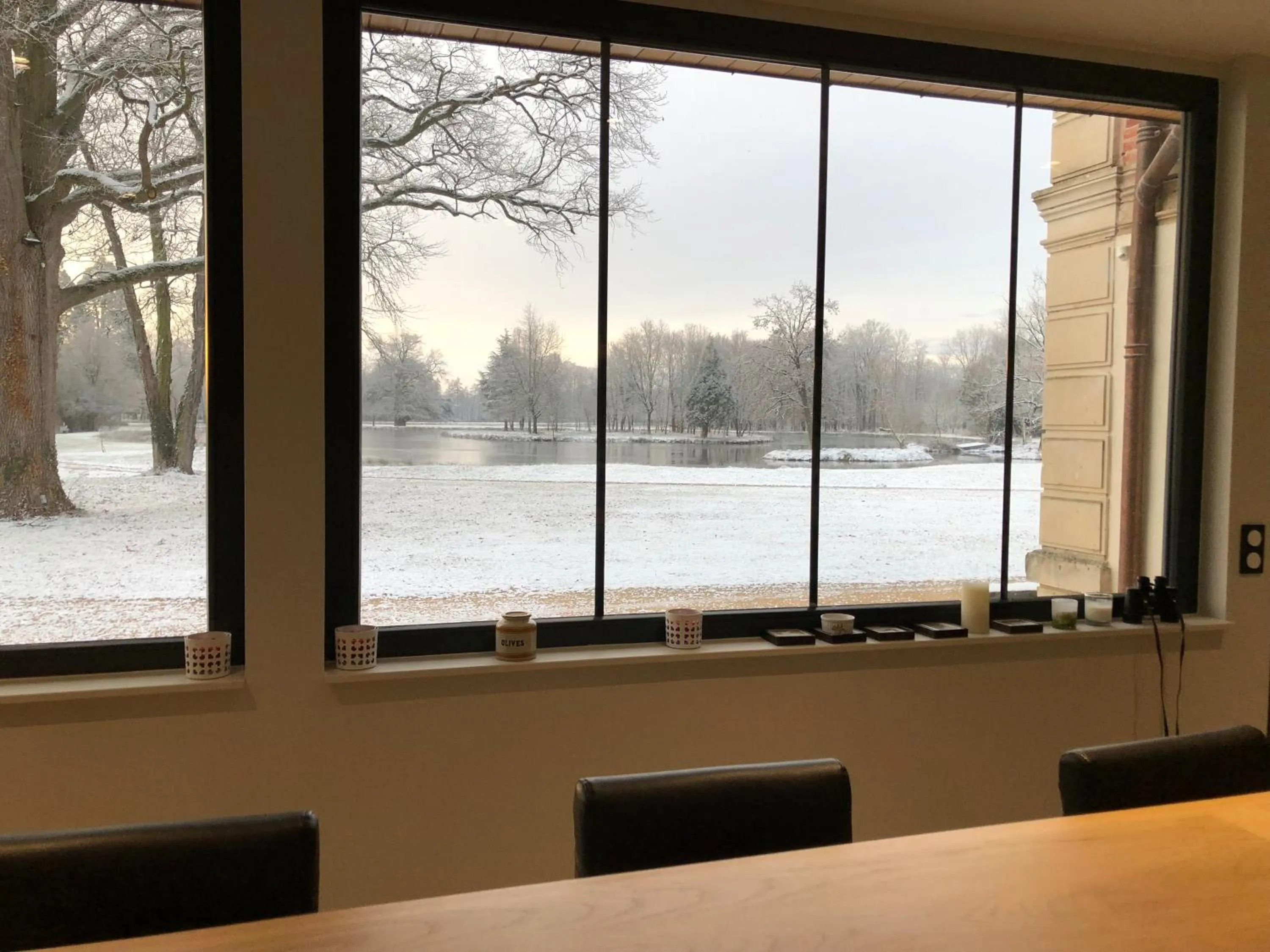 Communal kitchen in ORANGERIE de CHATEL-Selection FIGARO & ELLE Magazine