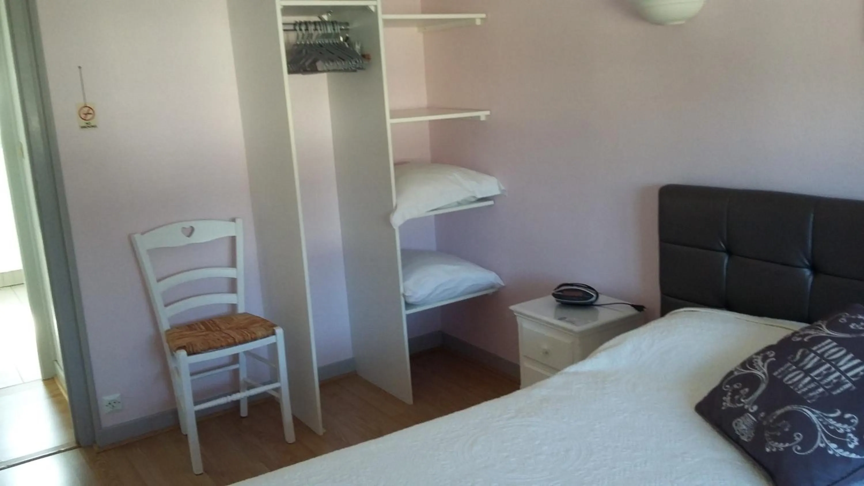 Bed in A La Bonne Adresse