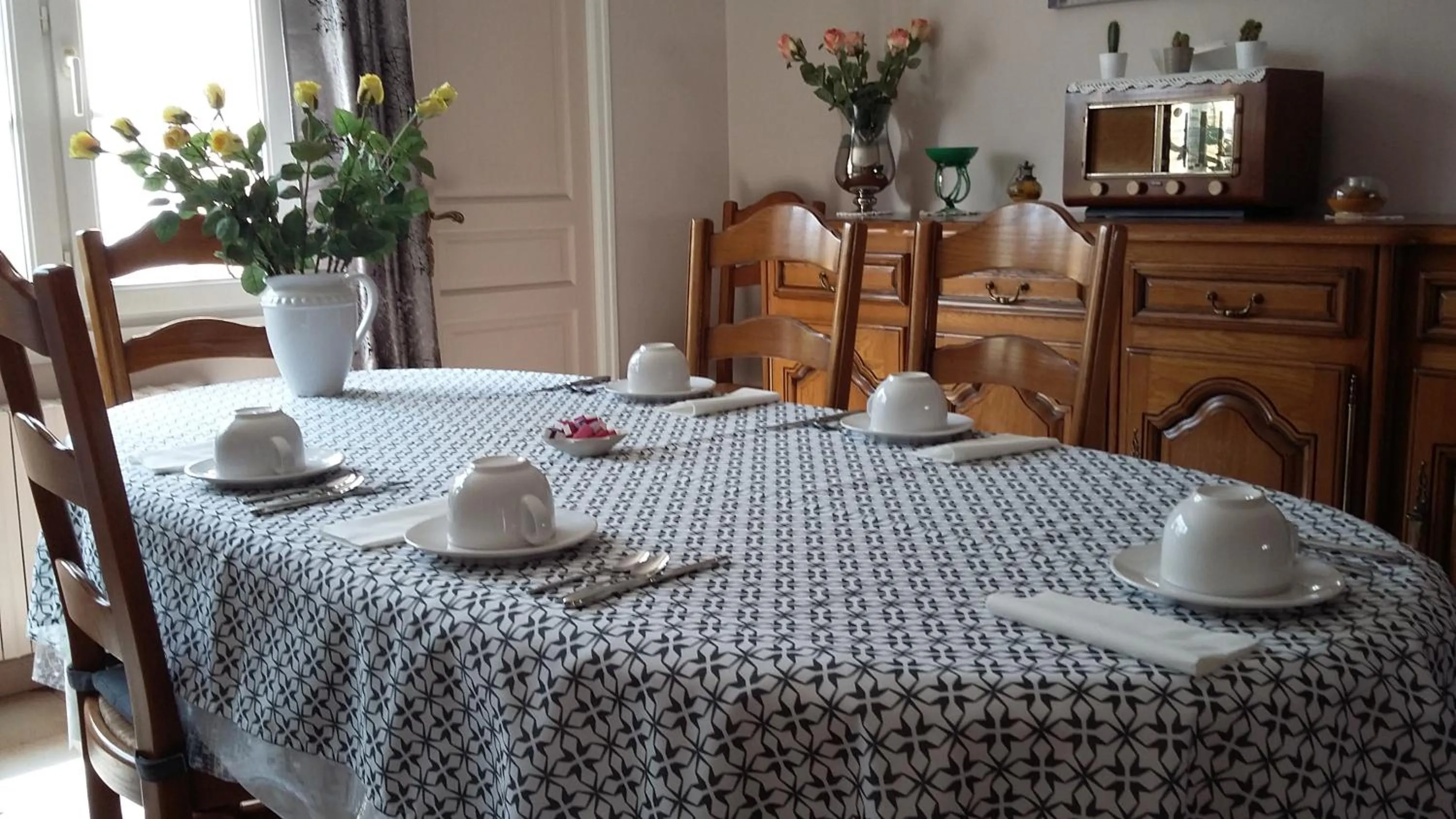 Dining area, Bed in A La Bonne Adresse