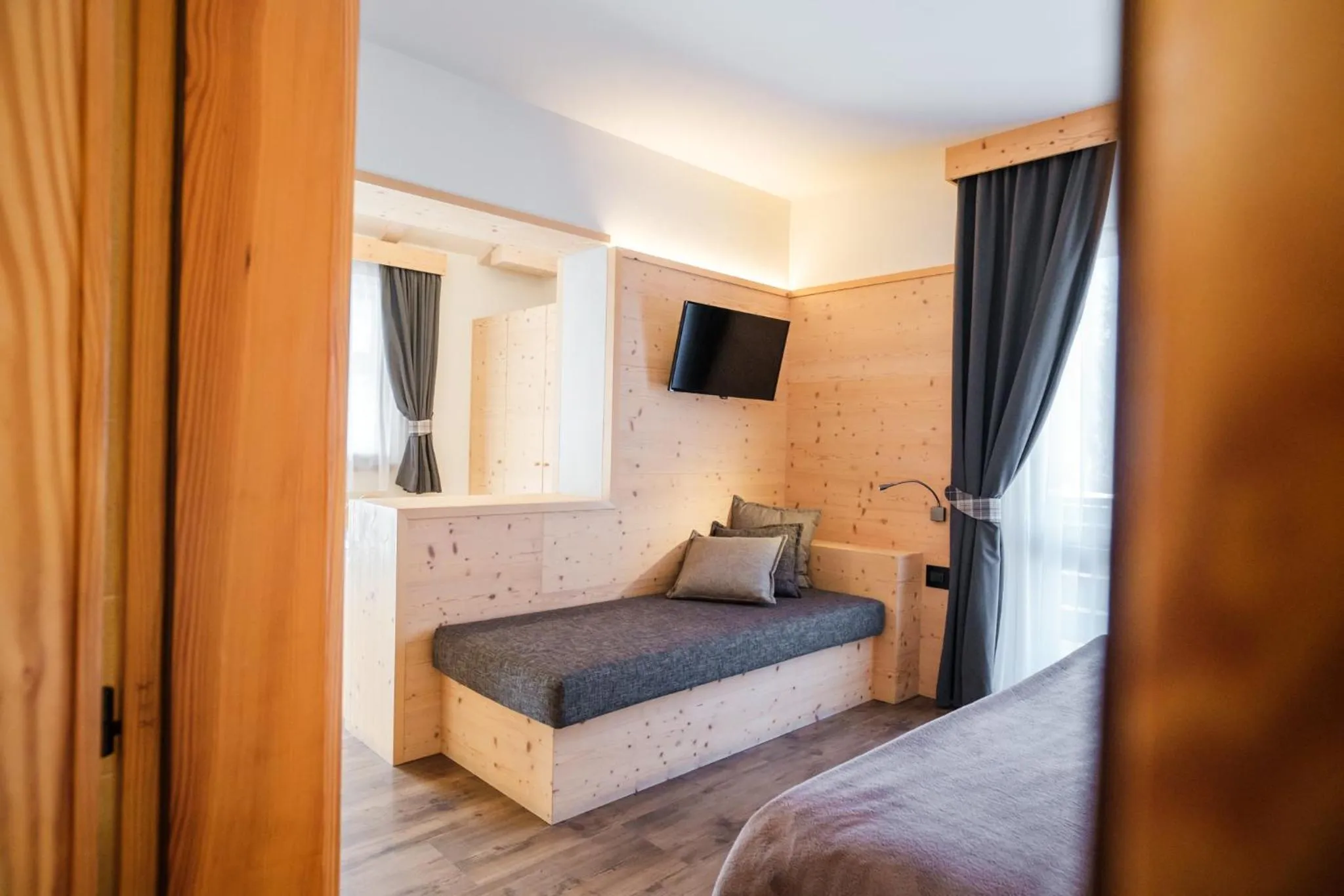 Seating area, Bed in Hotel Piccola Baita