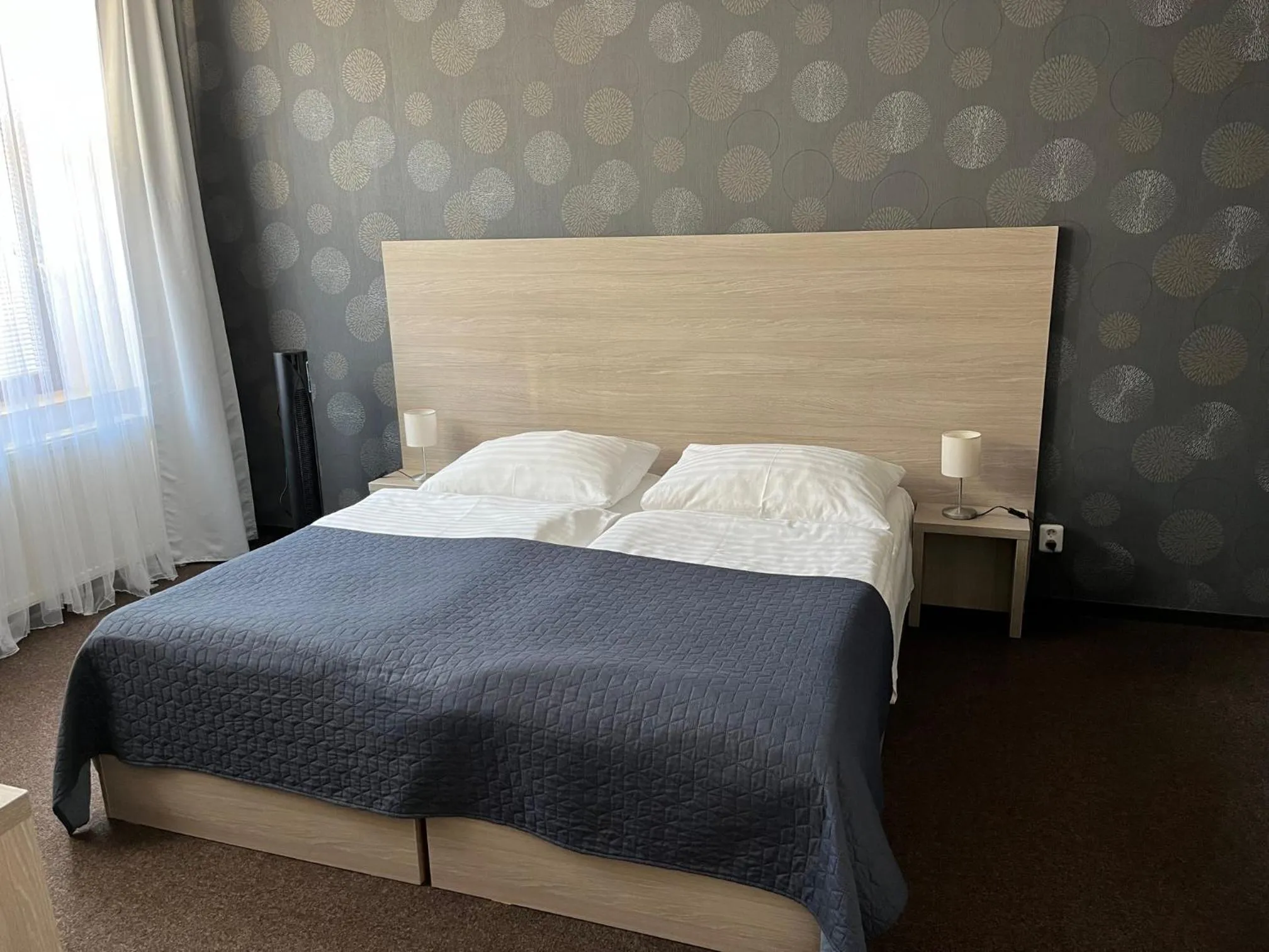 Text overlay, Bed in Hotel U Dvou medvídků