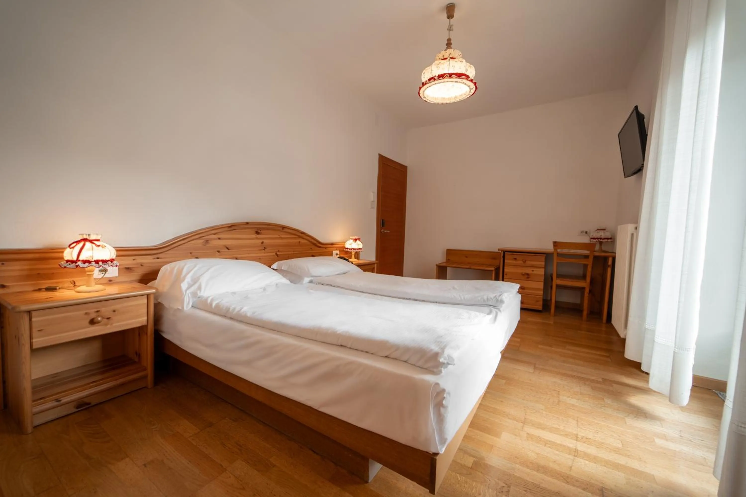 Bed in Dolomiti Hotel Cozzio