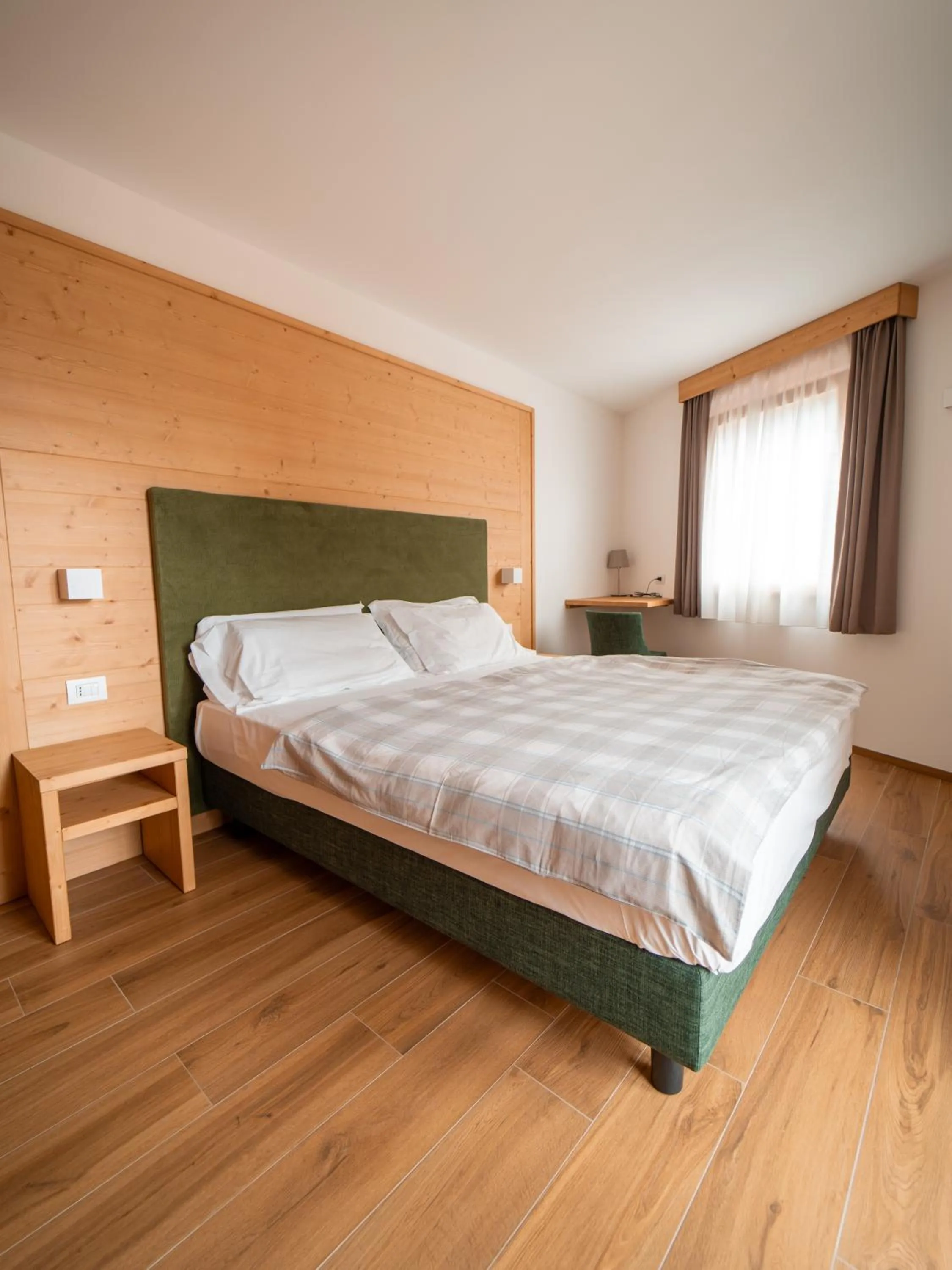 Bed in Dolomiti Hotel Cozzio