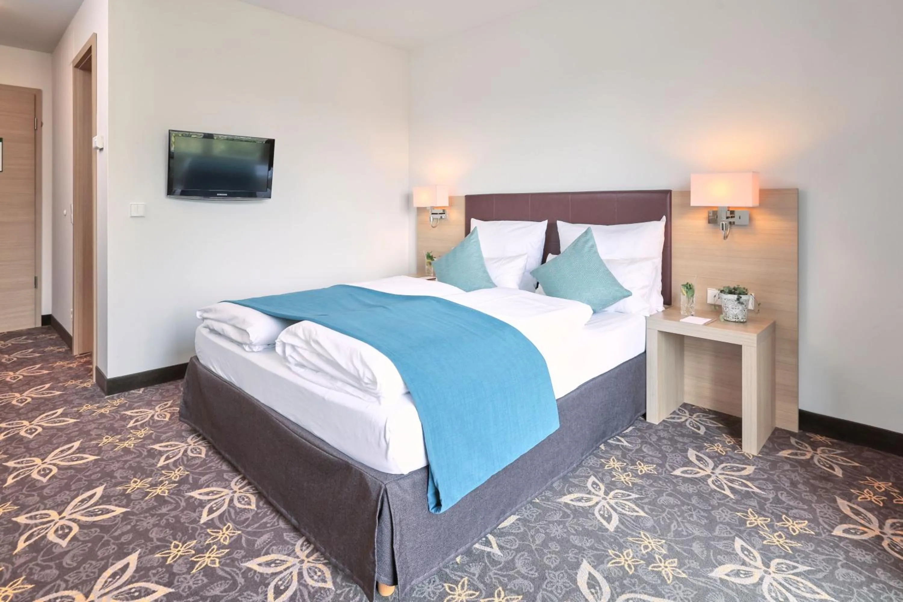 Bed in Hotel Württemberger Hof