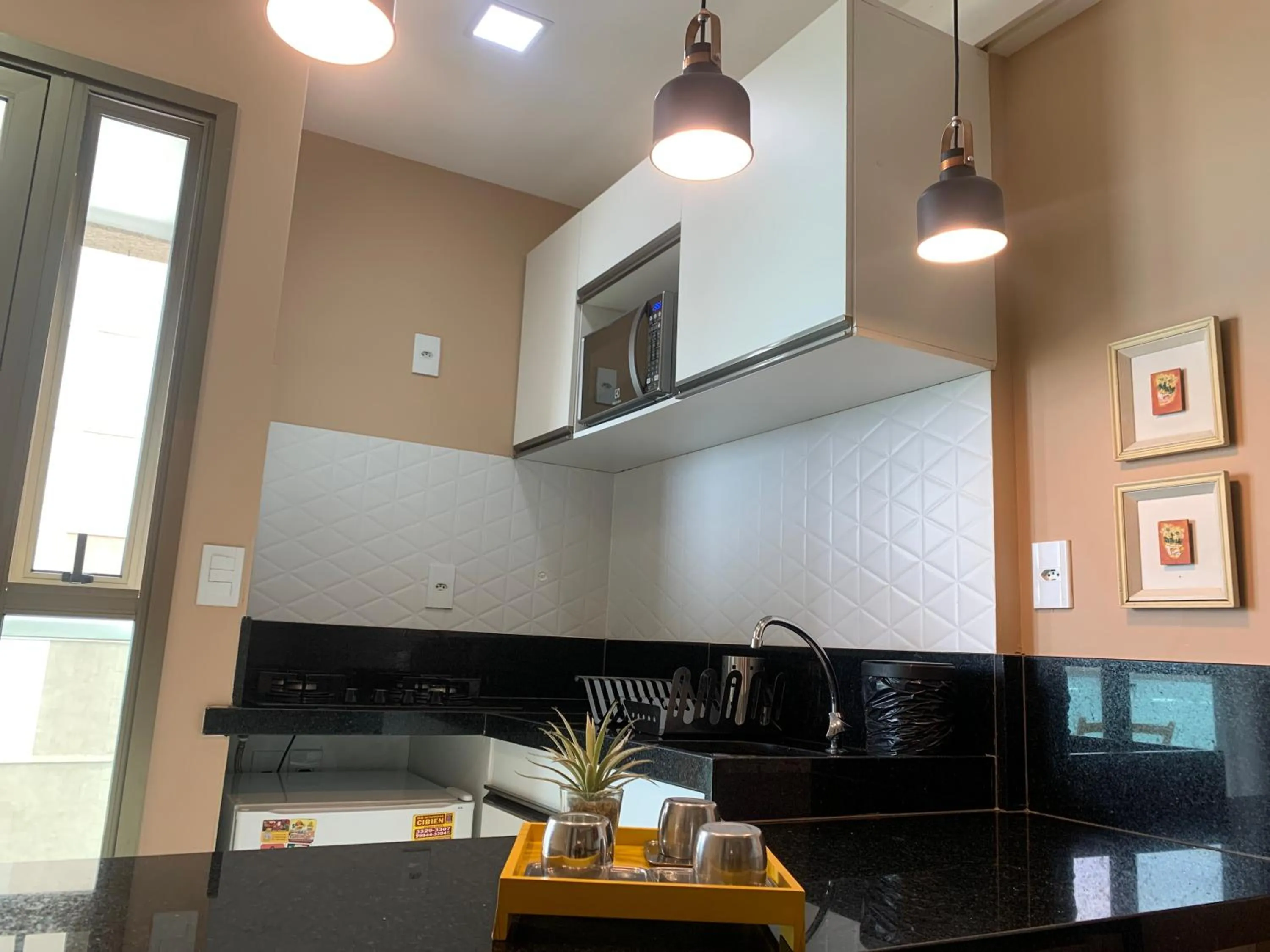 Kitchen or kitchenette in Ocean Flat Premium com vista para o mar