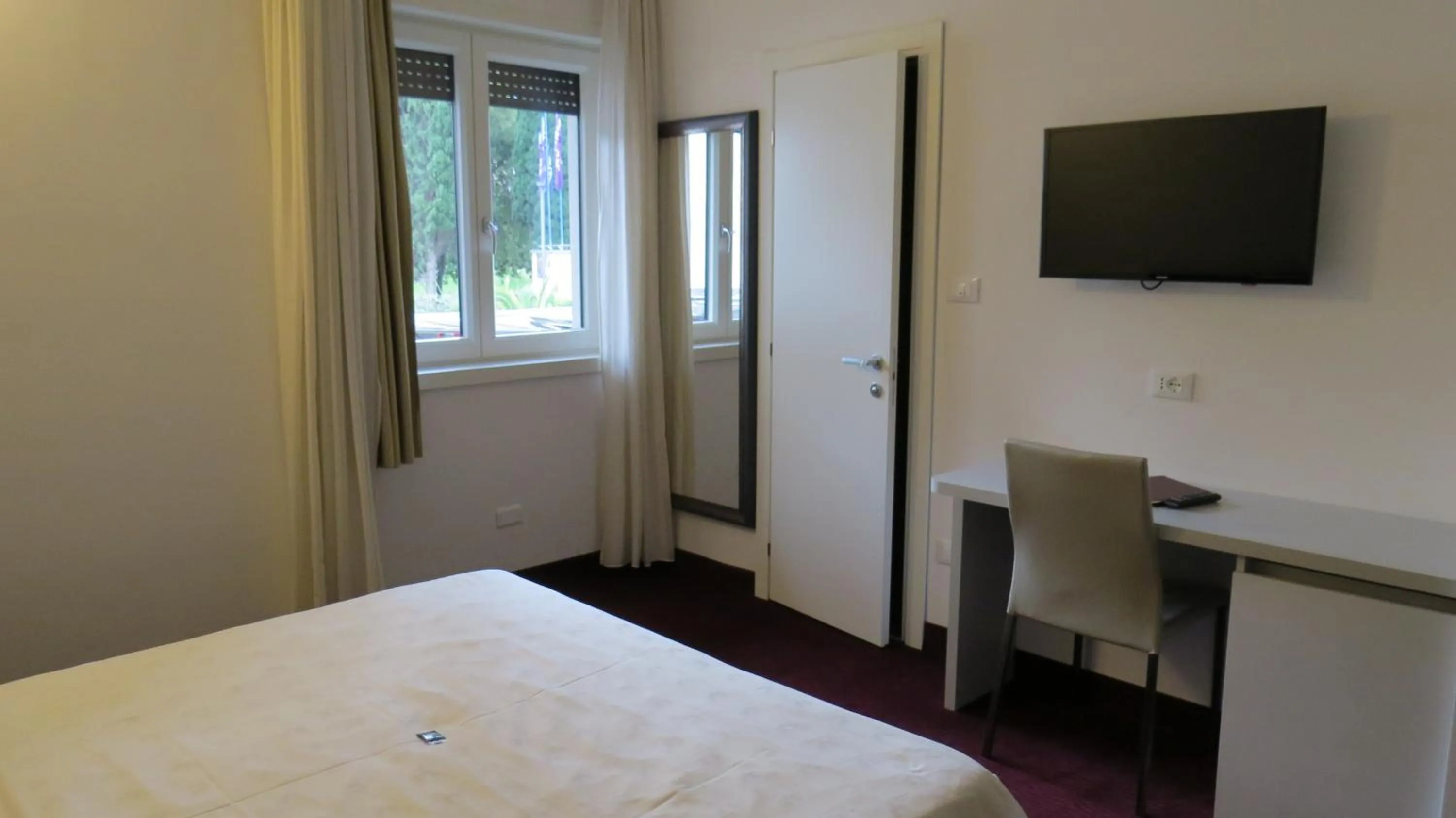 Bedroom in Hotel Villa Claudia