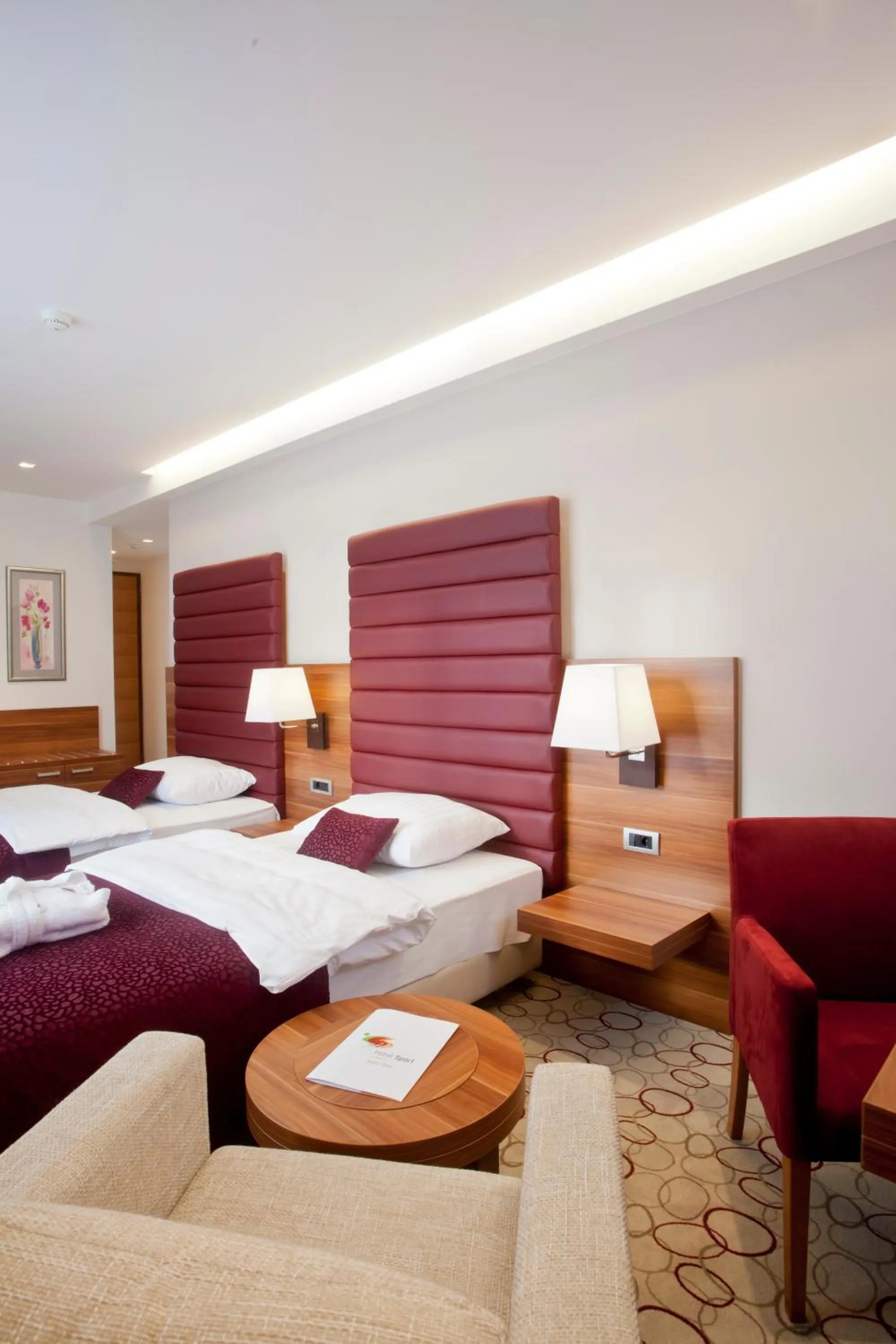 Seating area, Bed in Hotel Sport