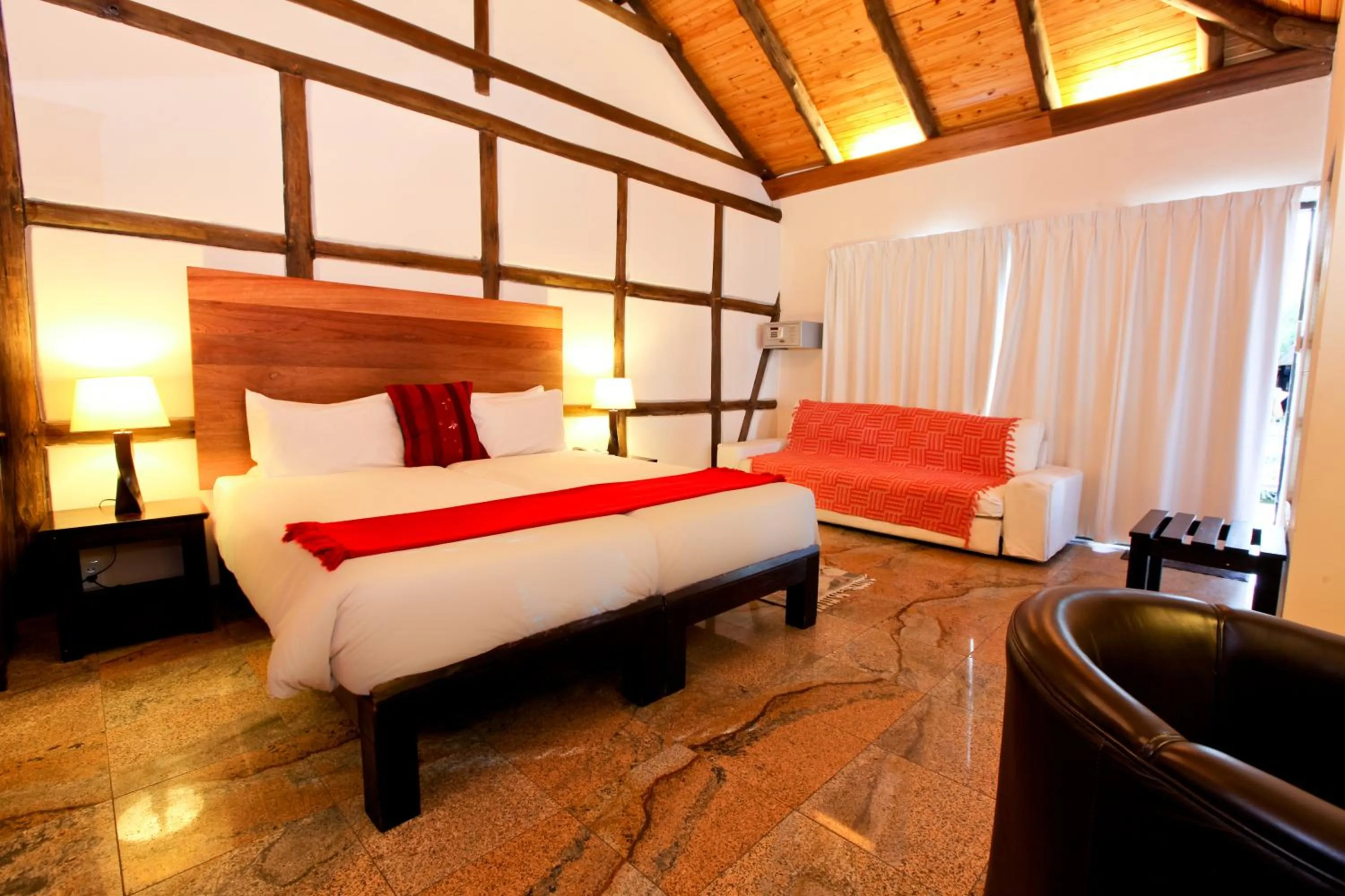 Photo of the whole room, Bed in Roof of Africa Hotel