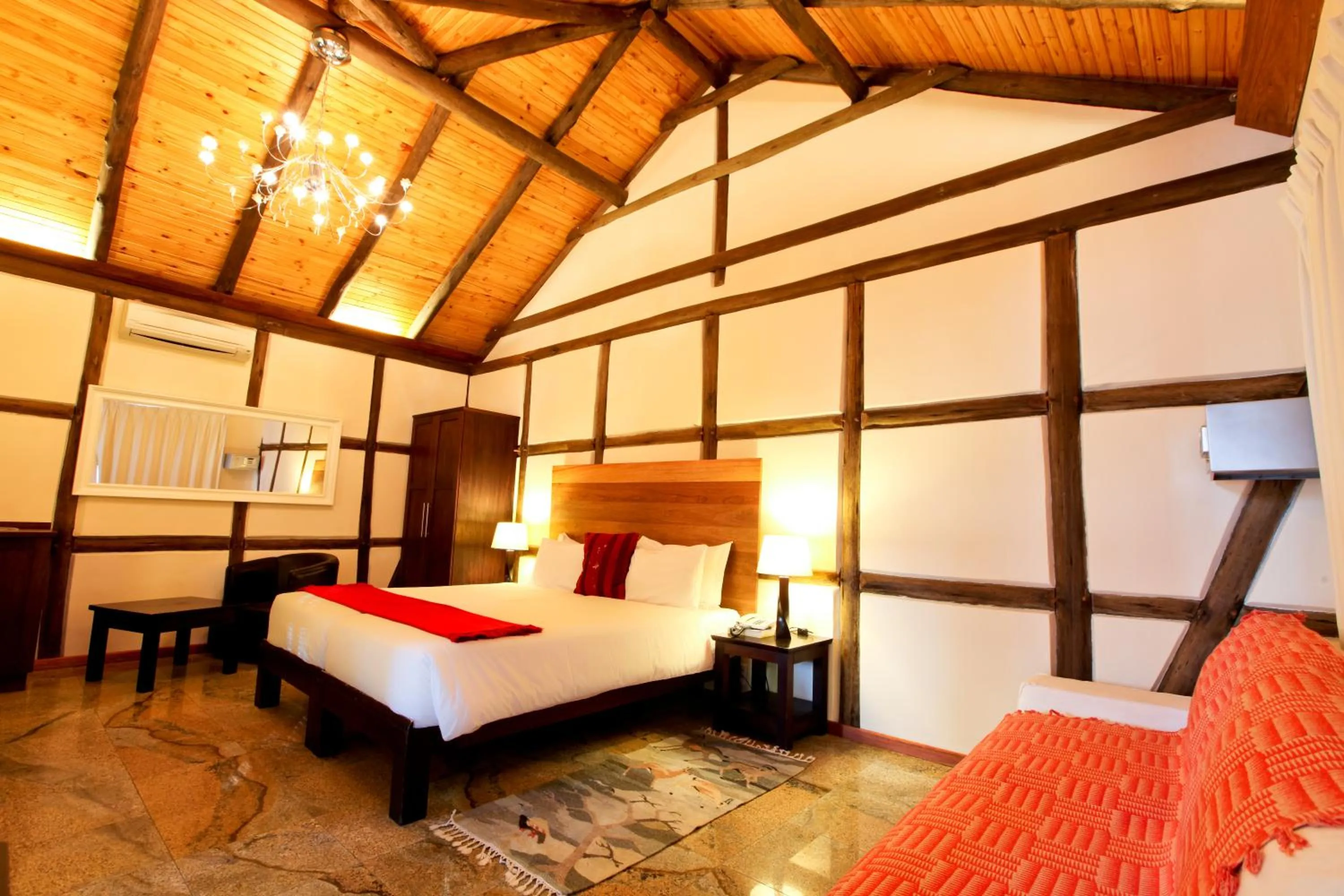 Photo of the whole room, Bed in Roof of Africa Hotel