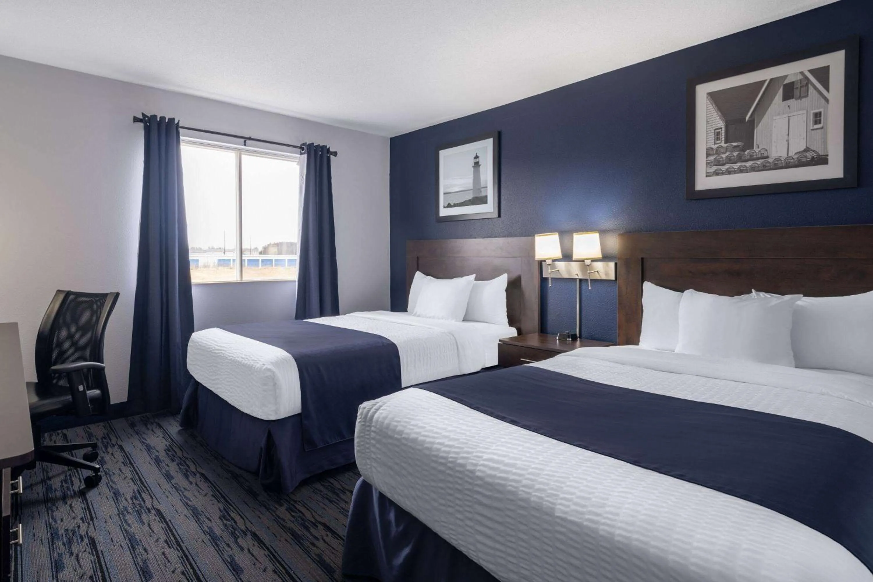 Bed in Travelodge Suites by Wyndham Saint John