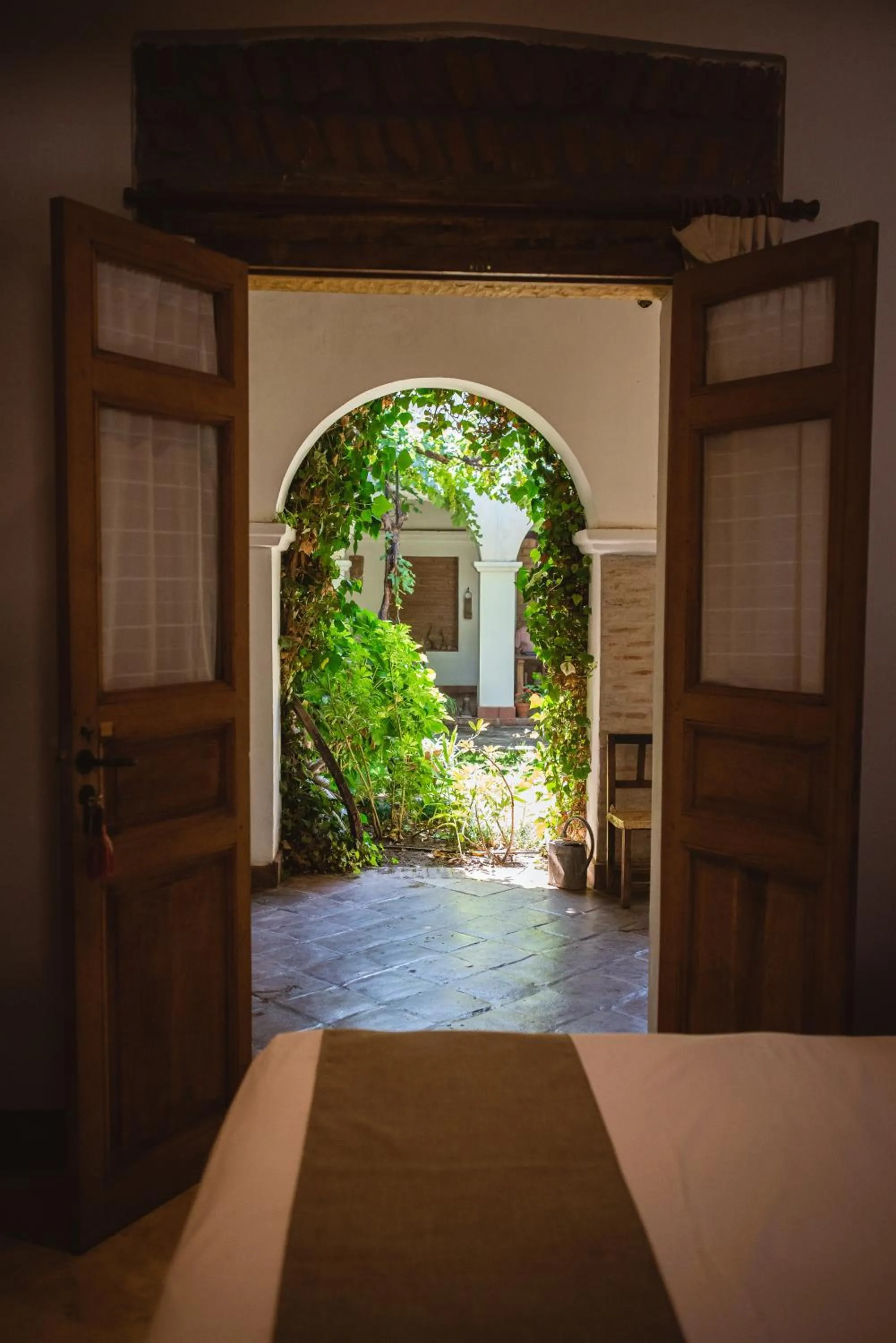 Garden view, Bed in Vieja Posada Hotel Histórico