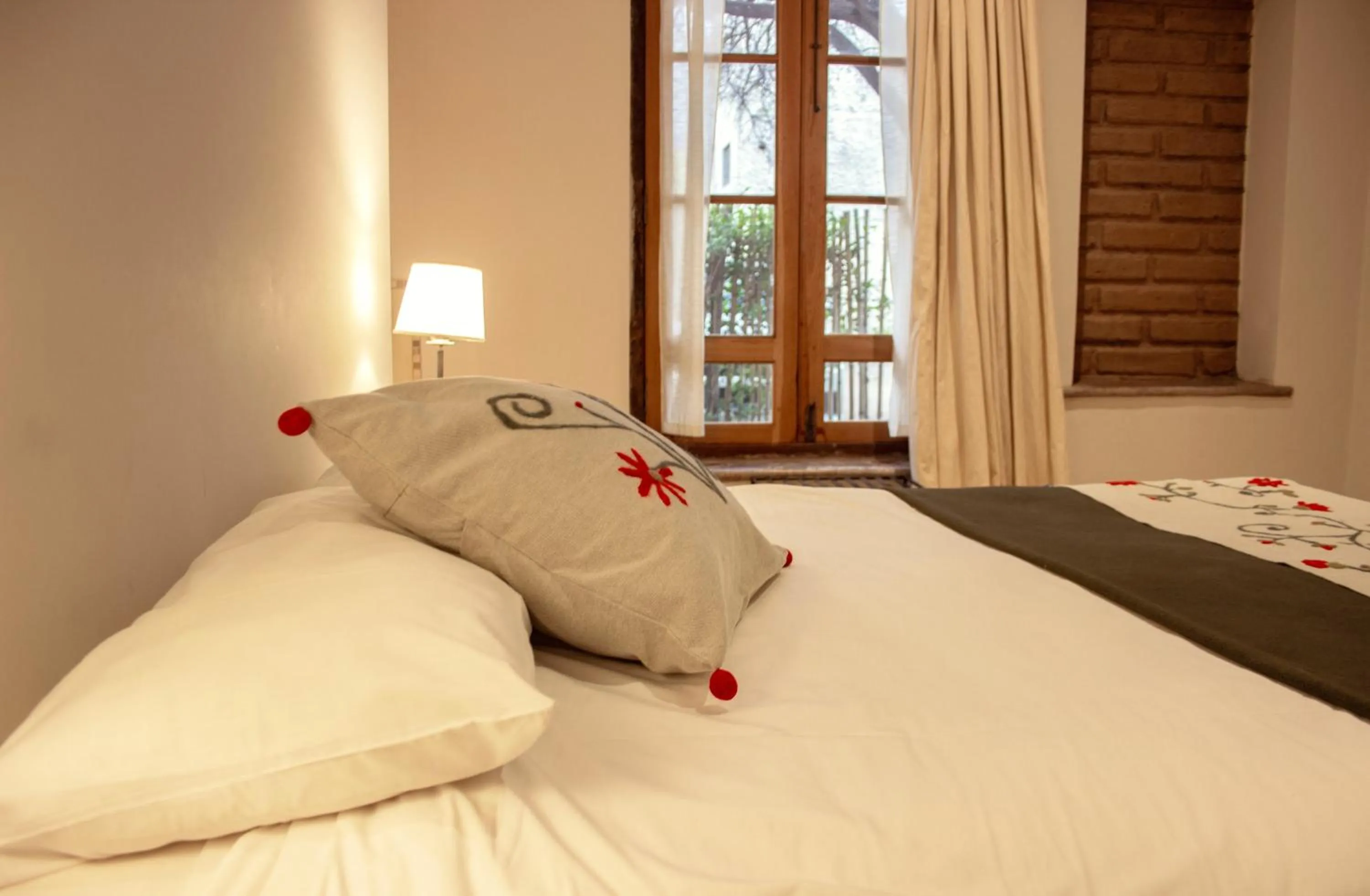 Garden view, Bed in Vieja Posada Hotel Histórico