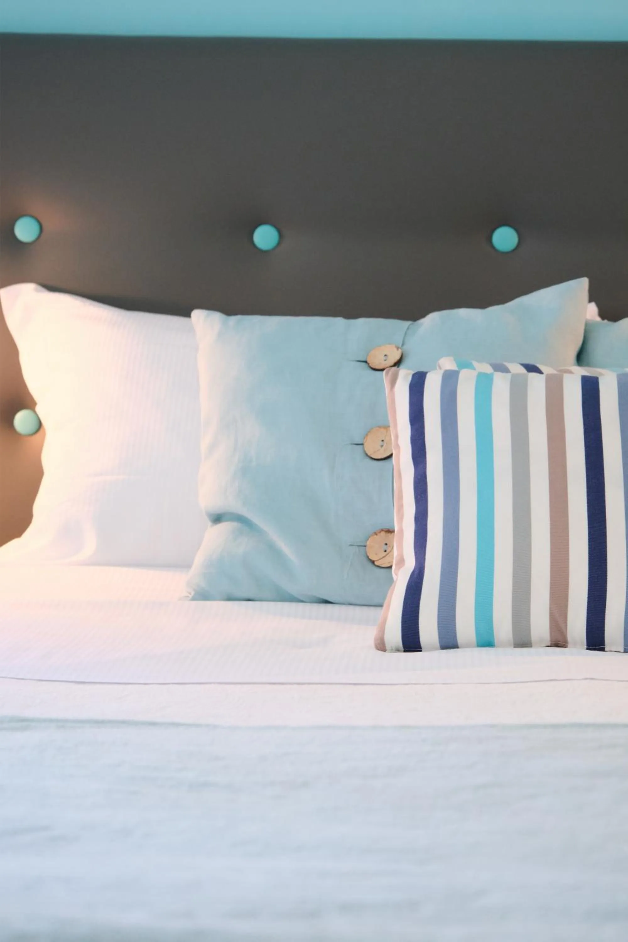 Bed in Pharus Miseni Suites and rooms