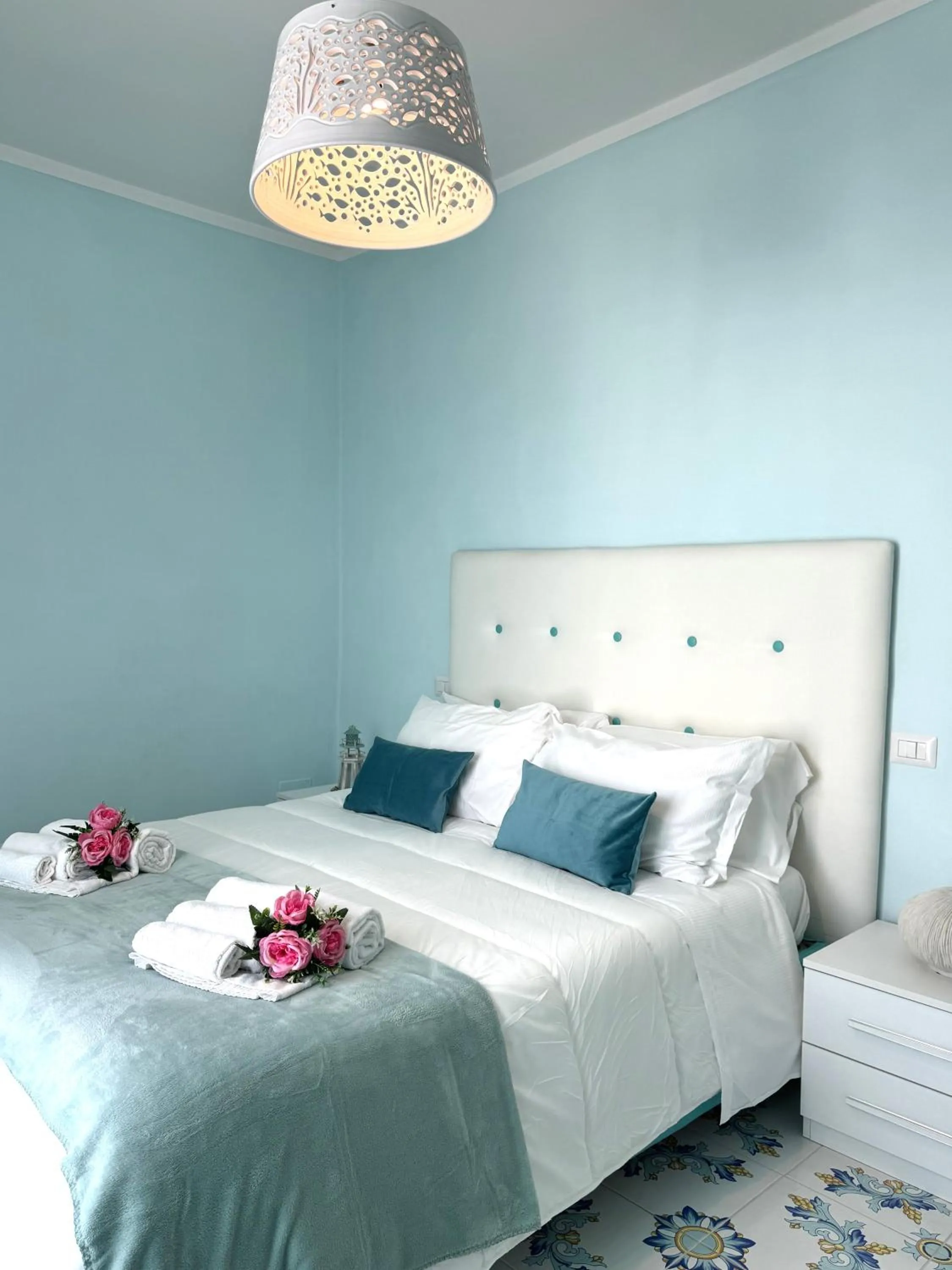 Bed in Pharus Miseni Suites and rooms