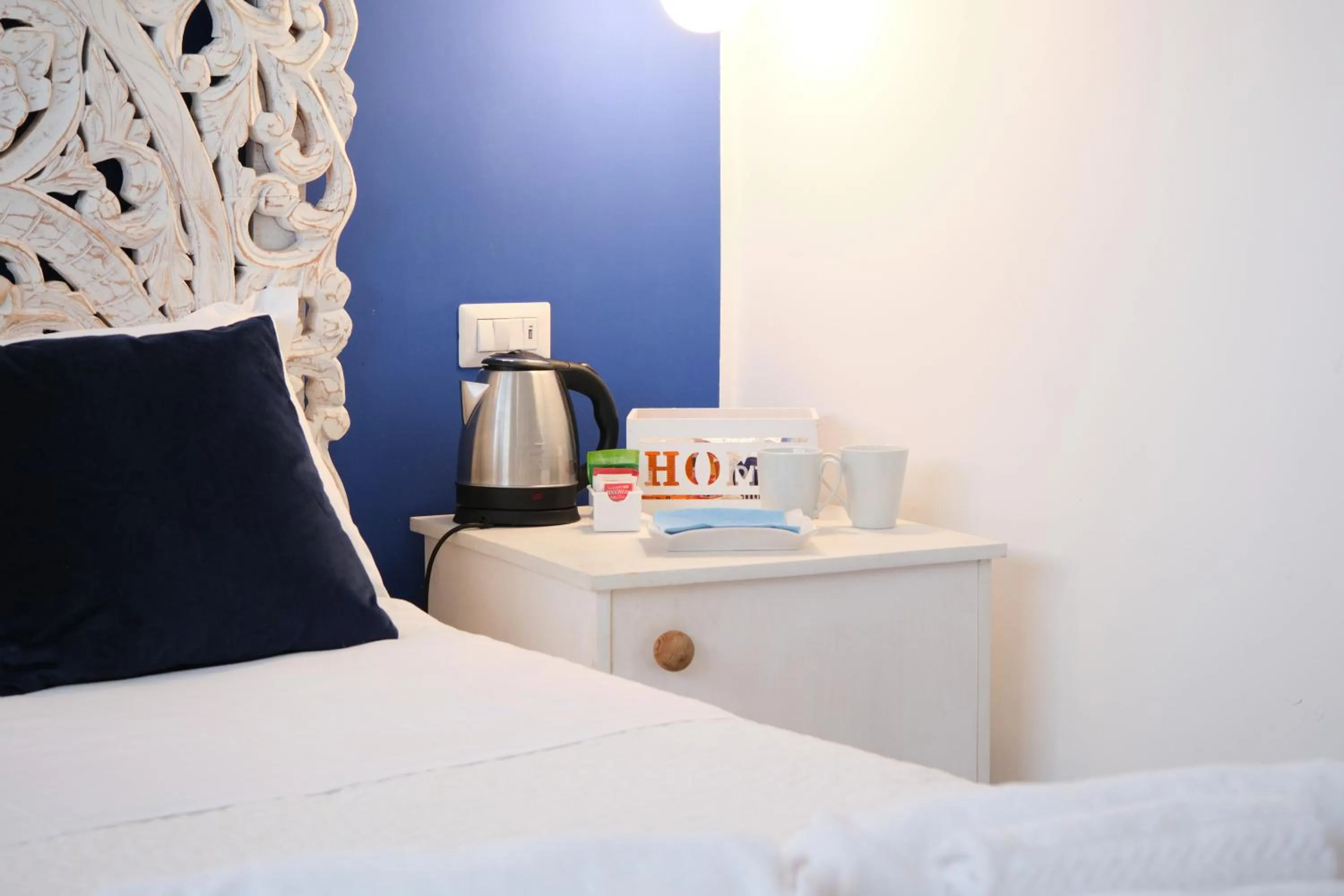 Coffee/tea facilities, Bed in Pharus Miseni Suites and rooms