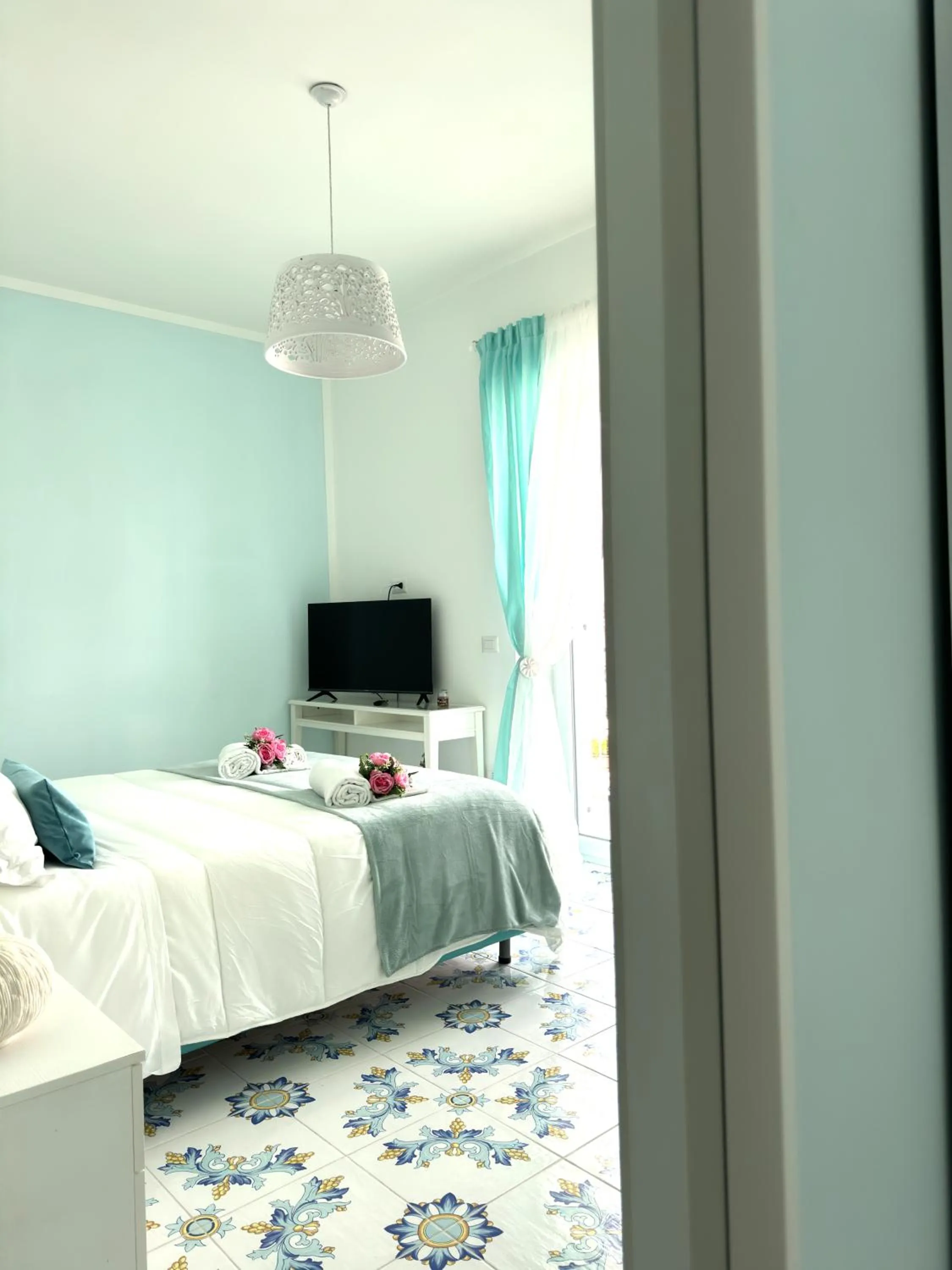 Bed in Pharus Miseni Suites and rooms