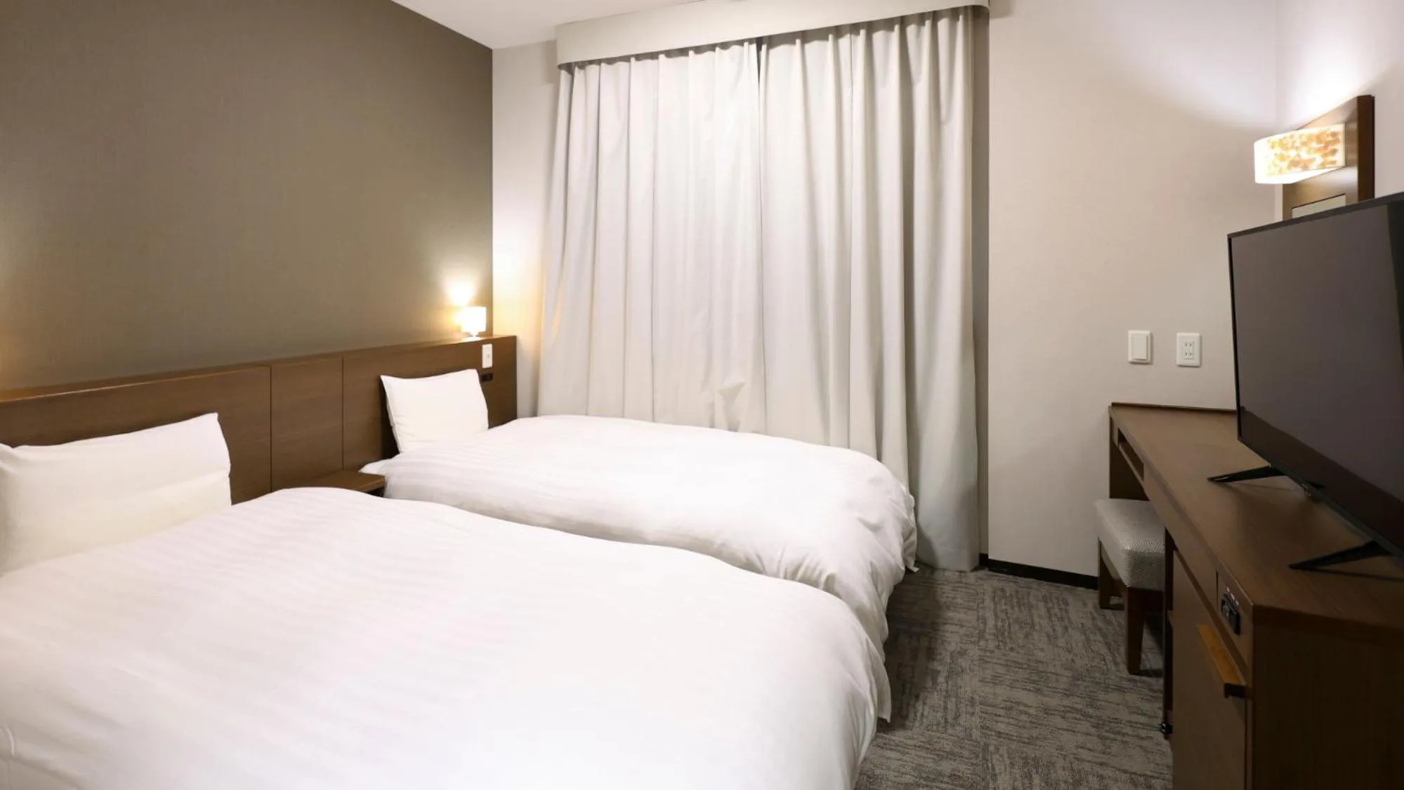 Bed in Dormy Inn Premium Shibuya-jingumae