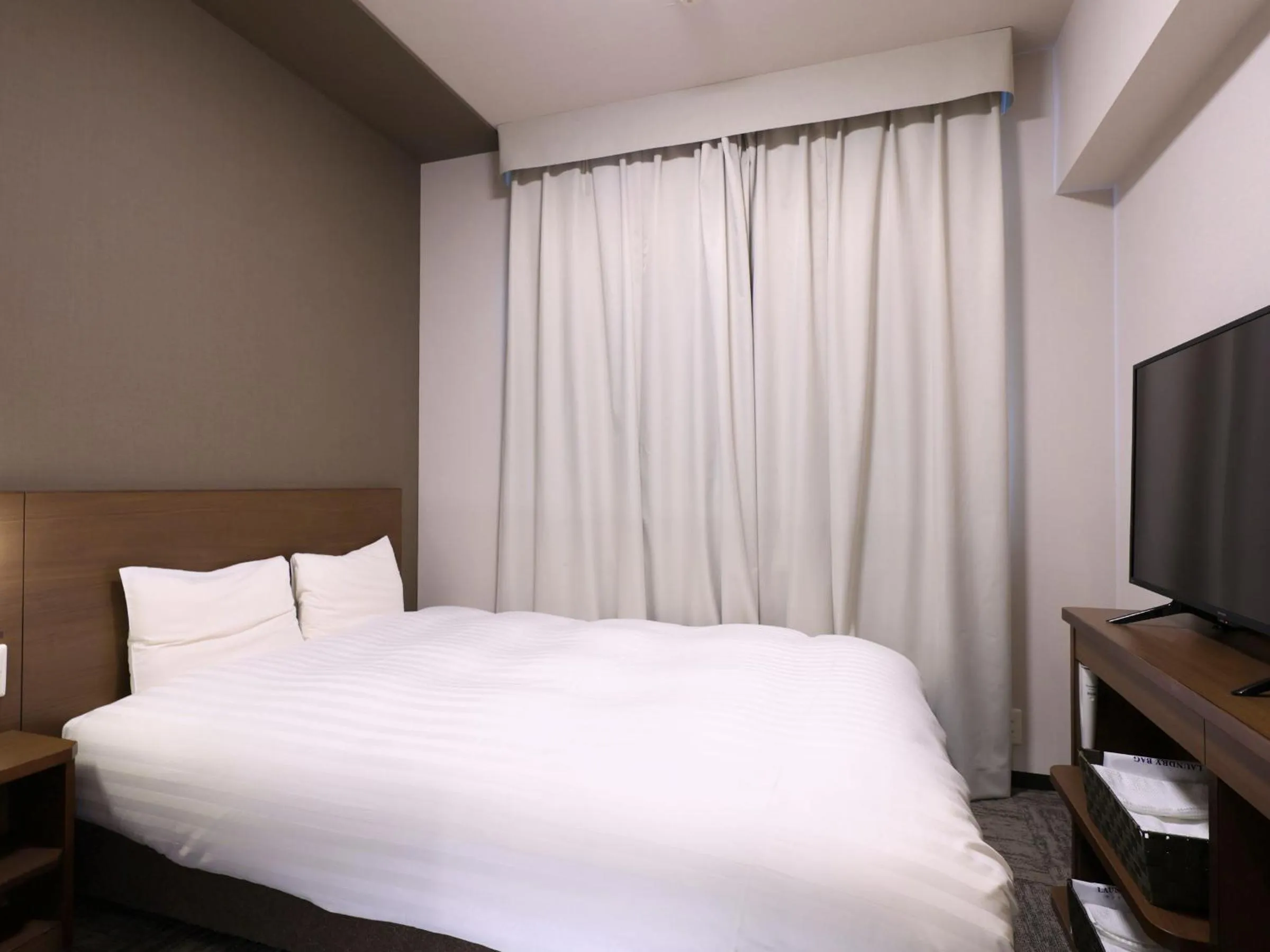 Photo of the whole room, Bed in Dormy Inn Premium Shibuya-jingumae
