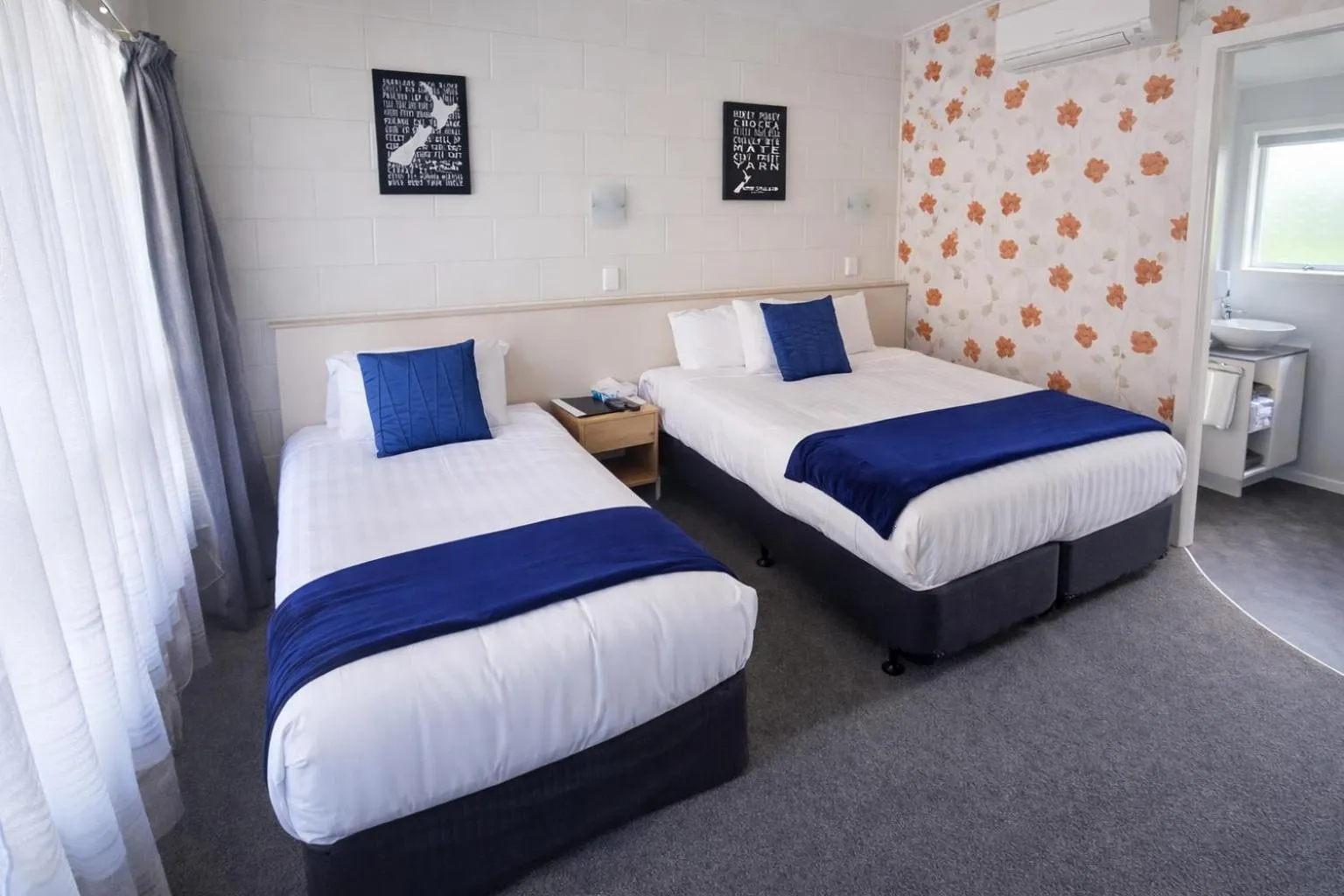 Bed in Tower Road Motel