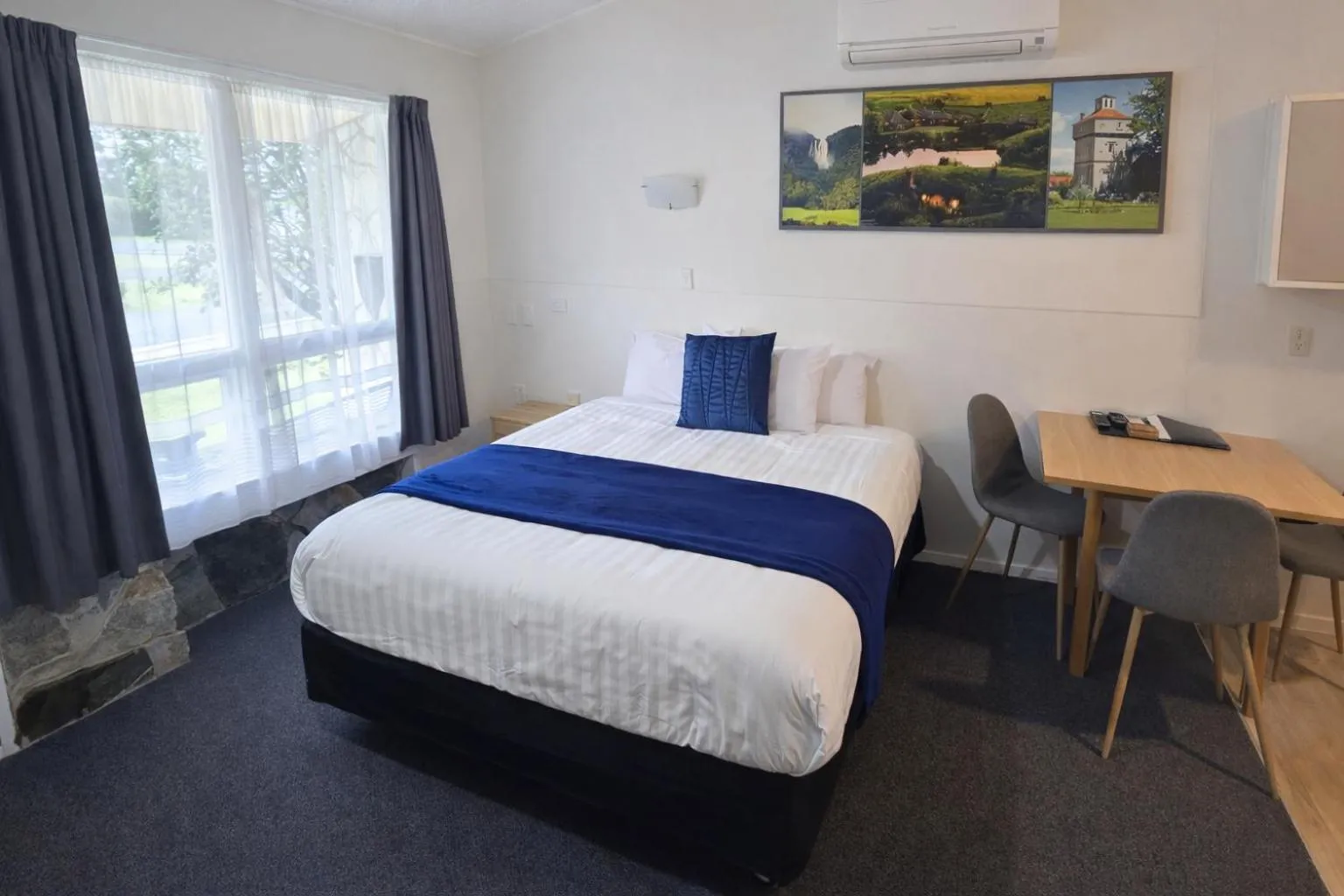 Bed in Tower Road Motel