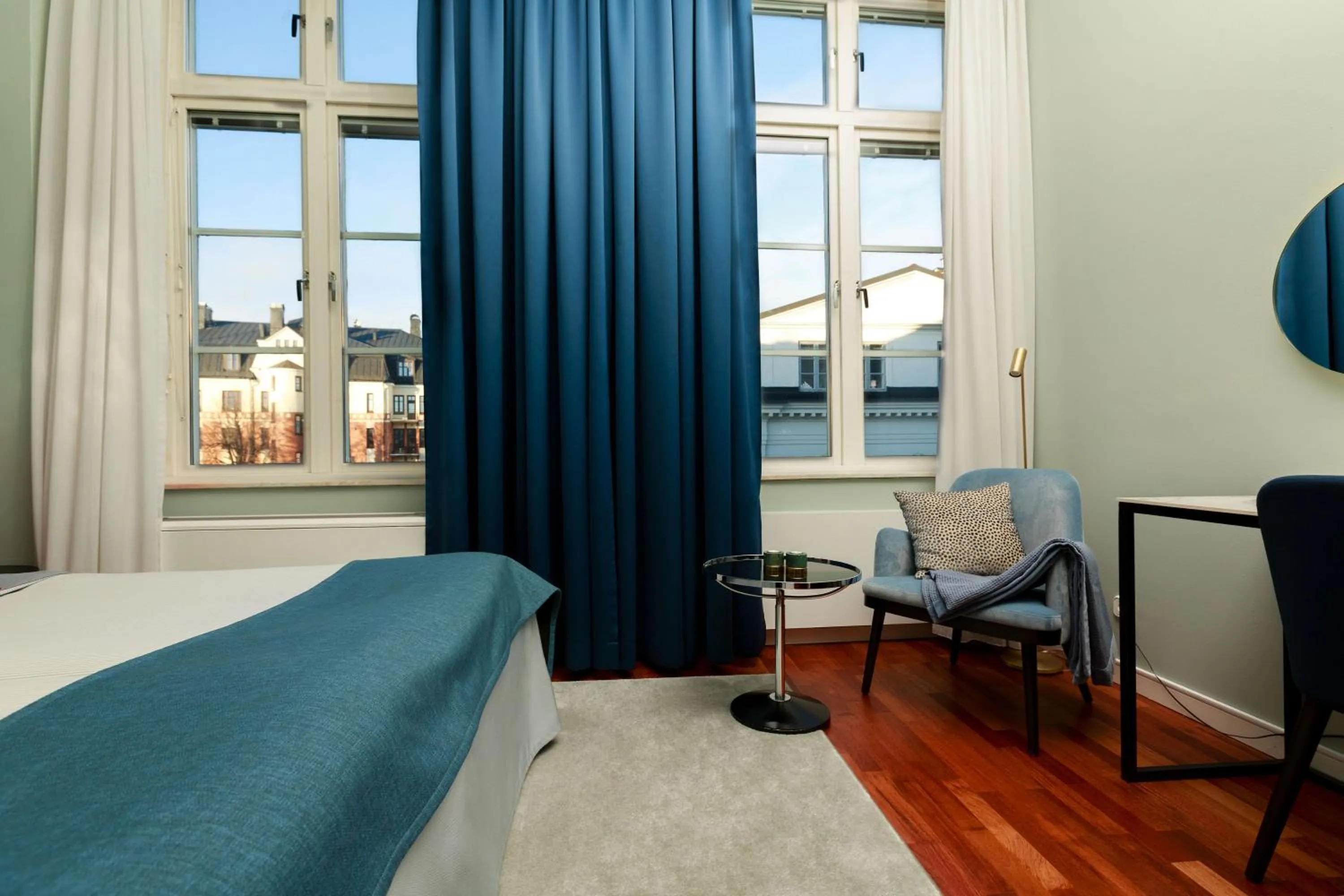 Seating area, Bed in Best Western Plus Västerviks Stadshotell