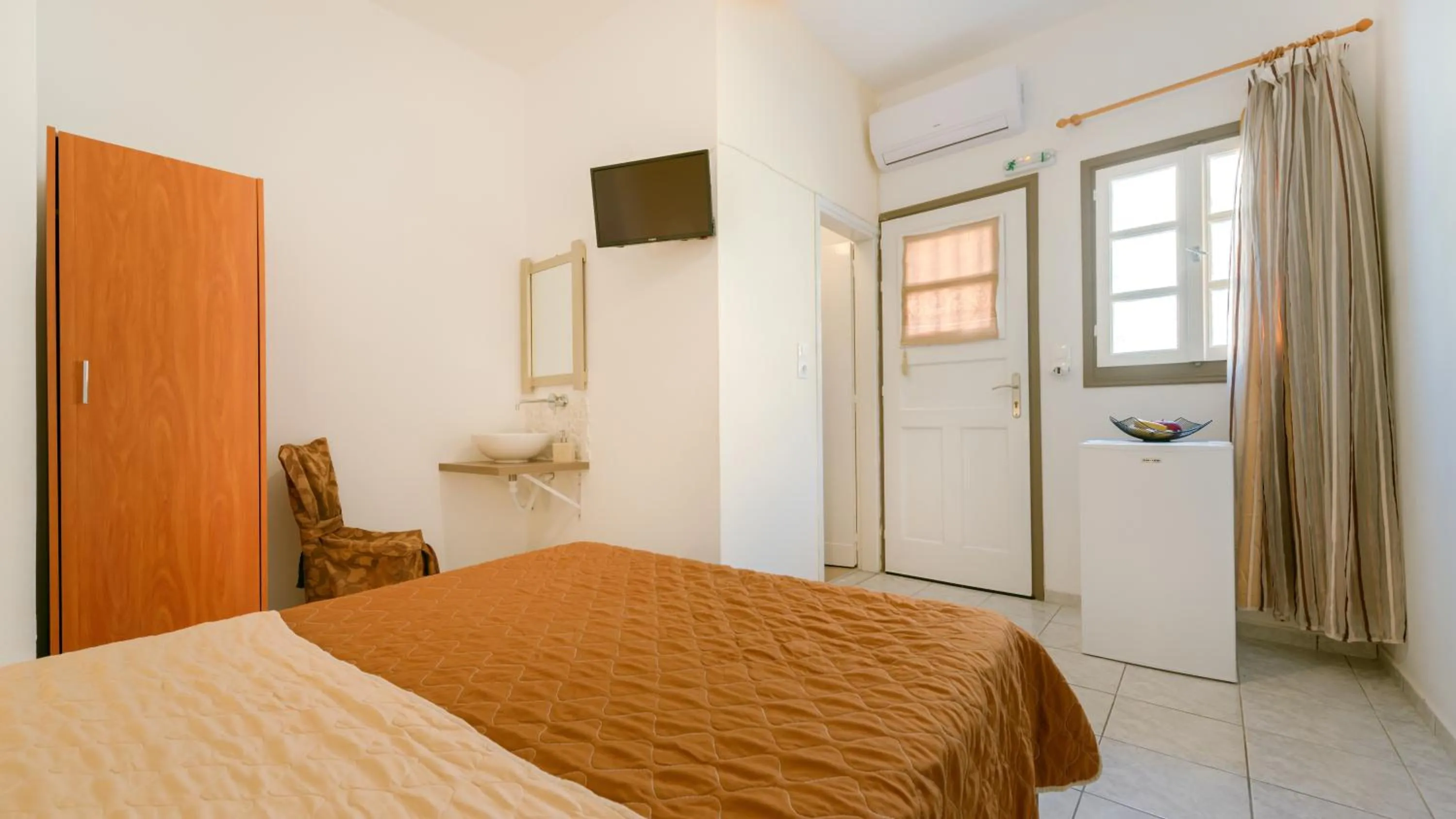 Bed in Onar Rooms & Studios