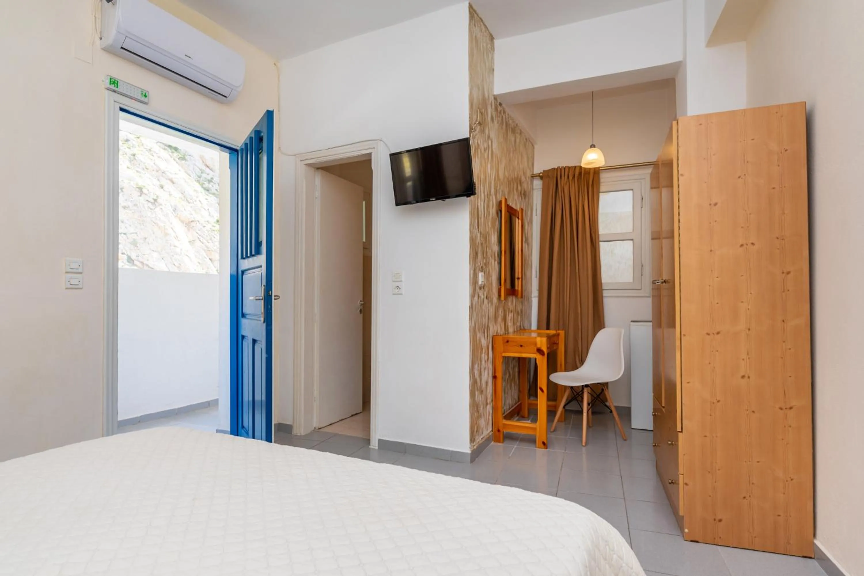 Bed in Onar Rooms & Studios