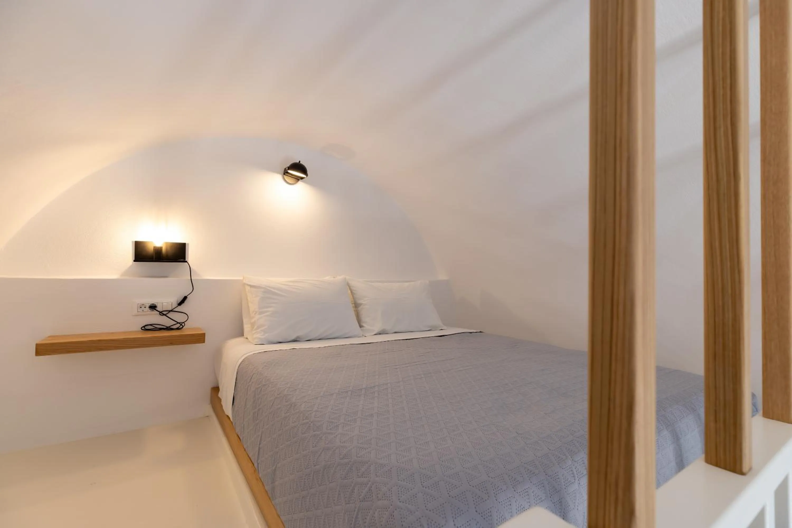 Bed in Louis Studios Santorini
