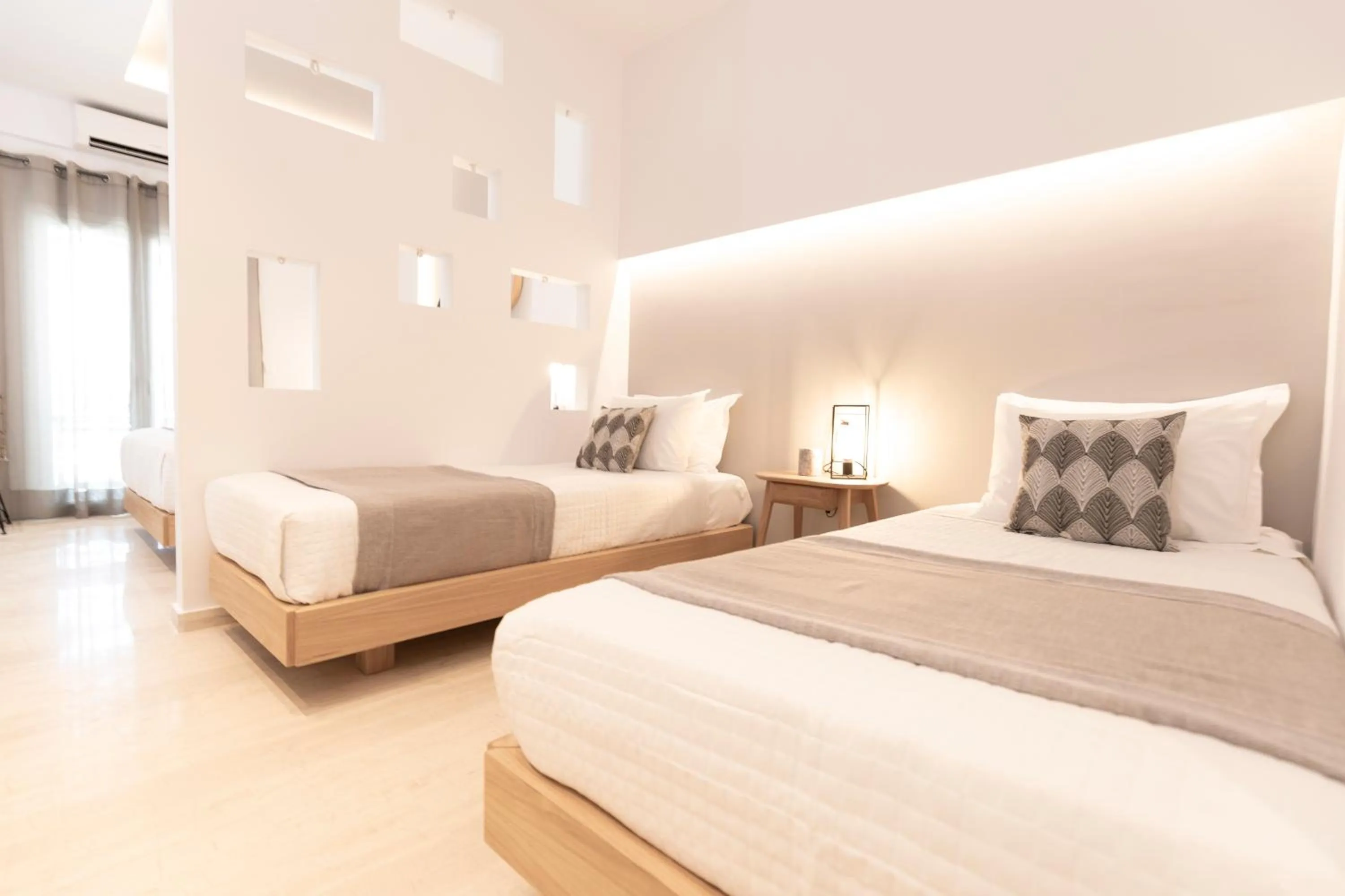 Property building, Bed in Louis Studios Santorini