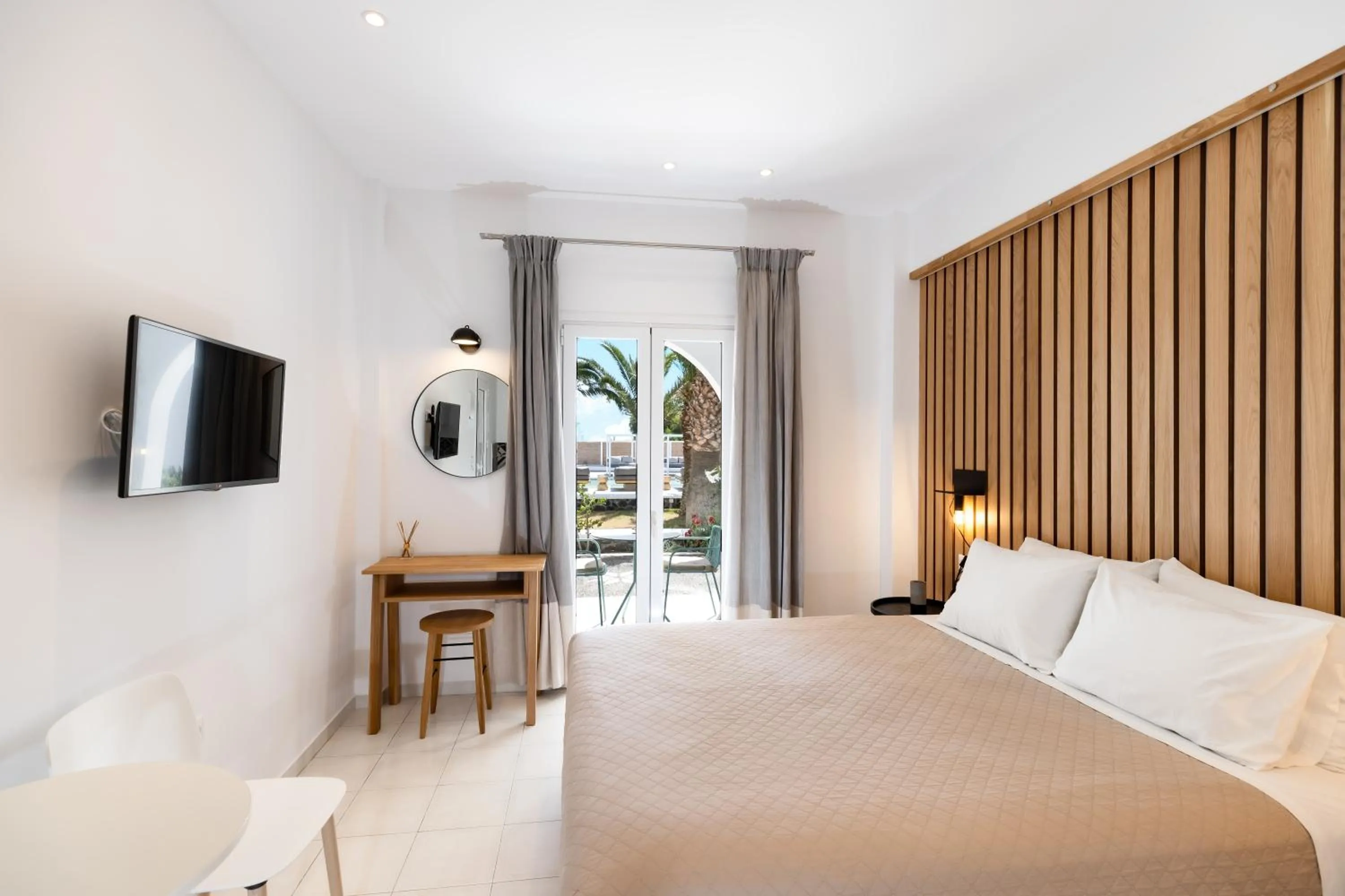 Bedroom, Bed in Louis Studios Santorini