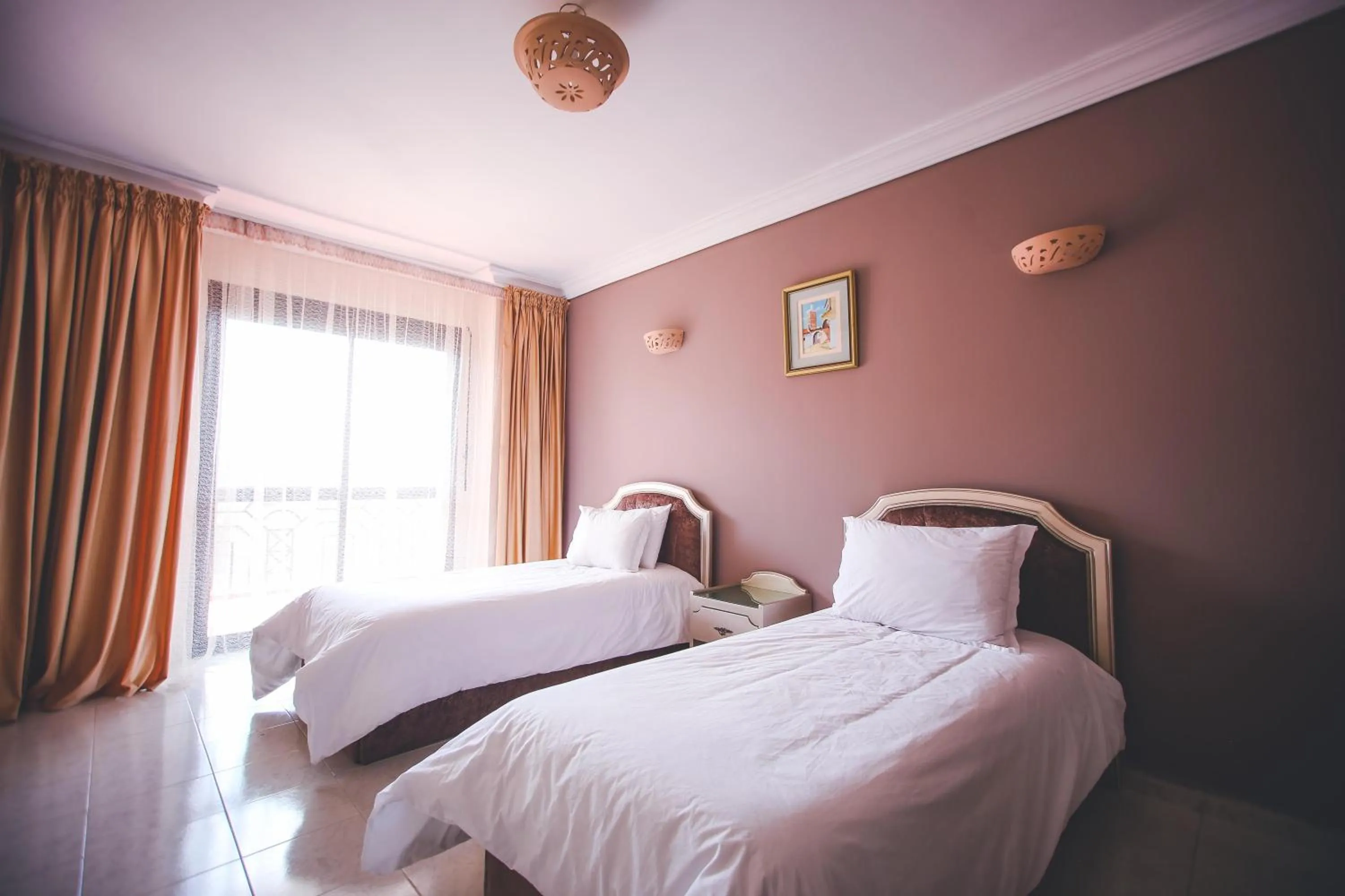 Bed in Appart Hotel Alia