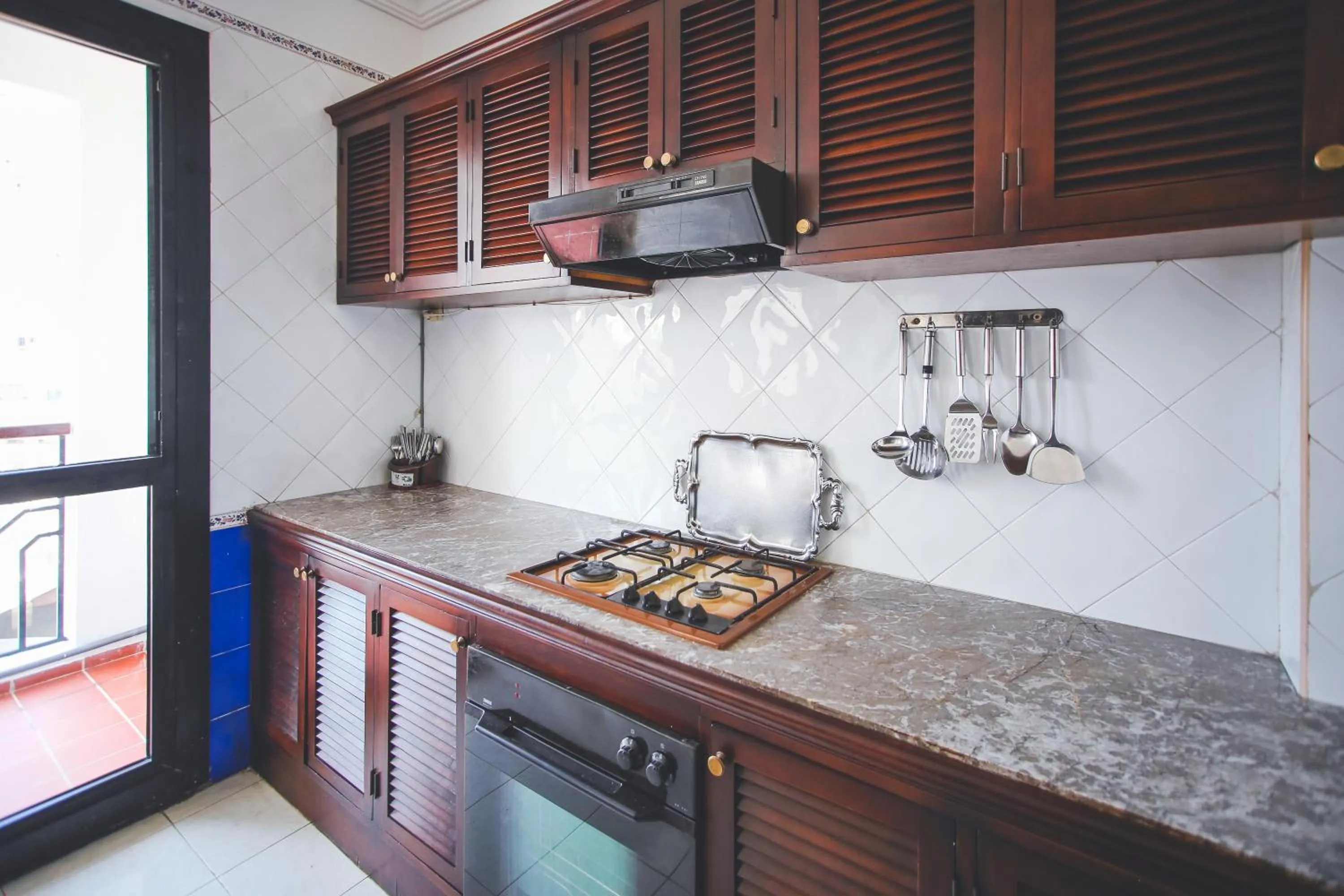Kitchen or kitchenette in Appart Hotel Alia