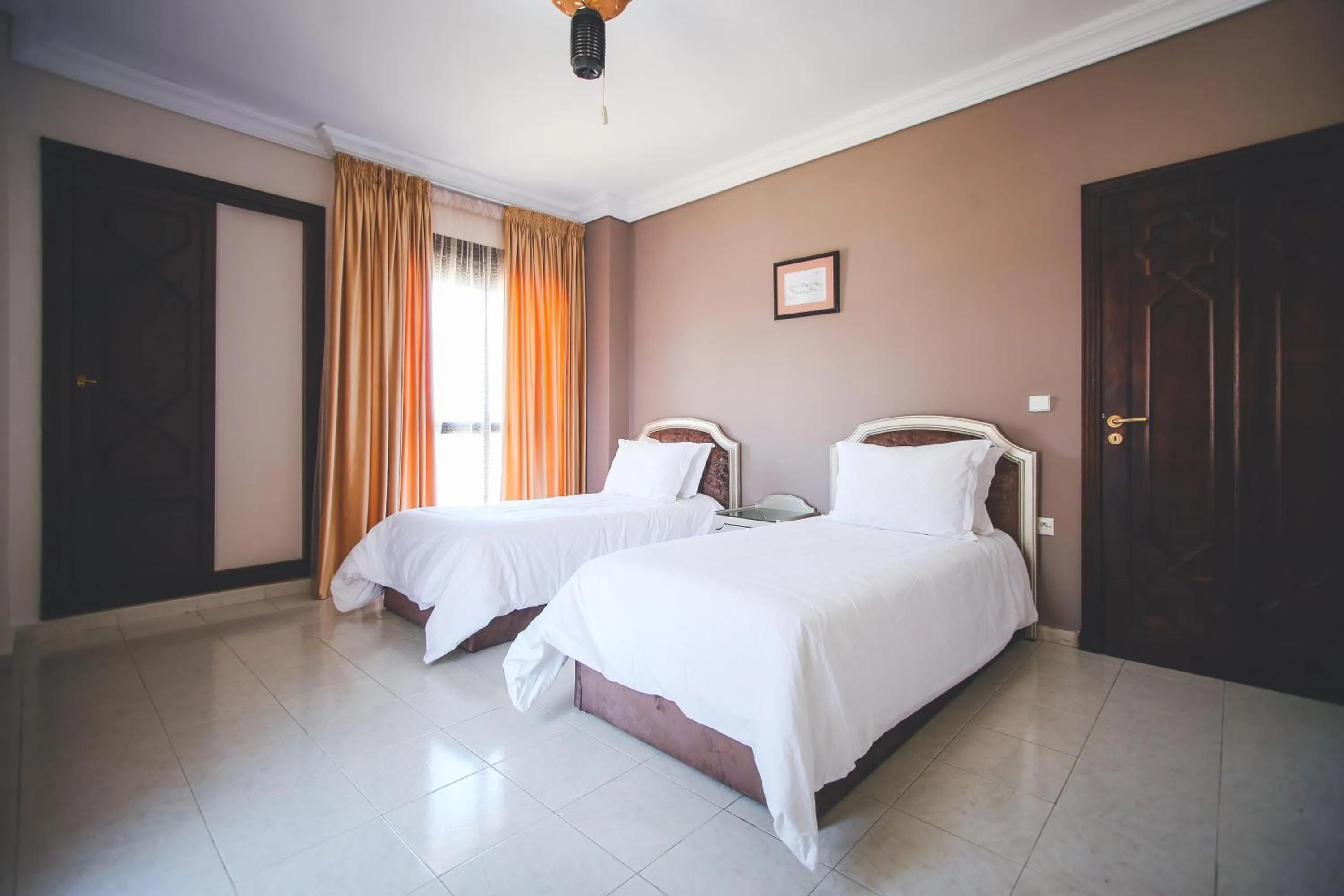 Bed in Appart Hotel Alia