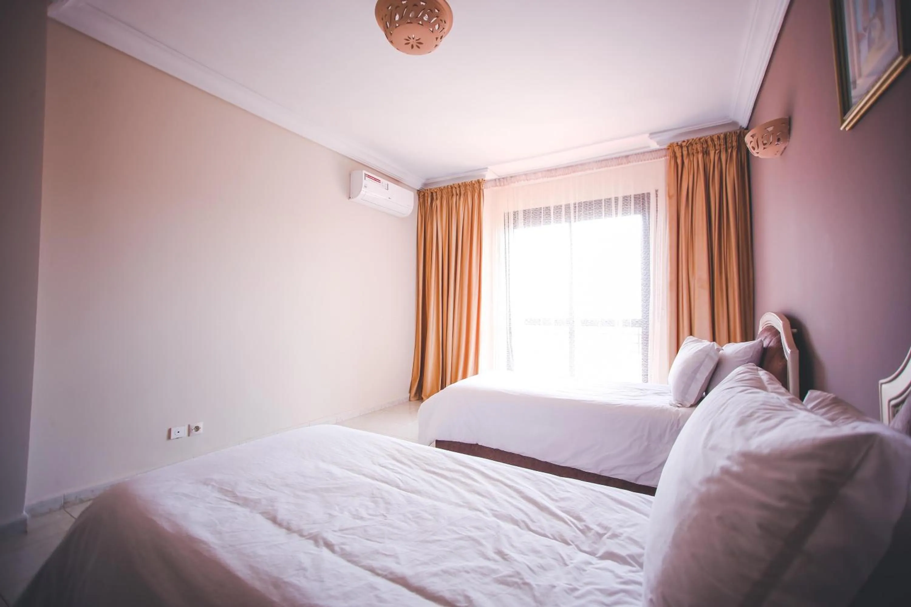 Bed in Appart Hotel Alia