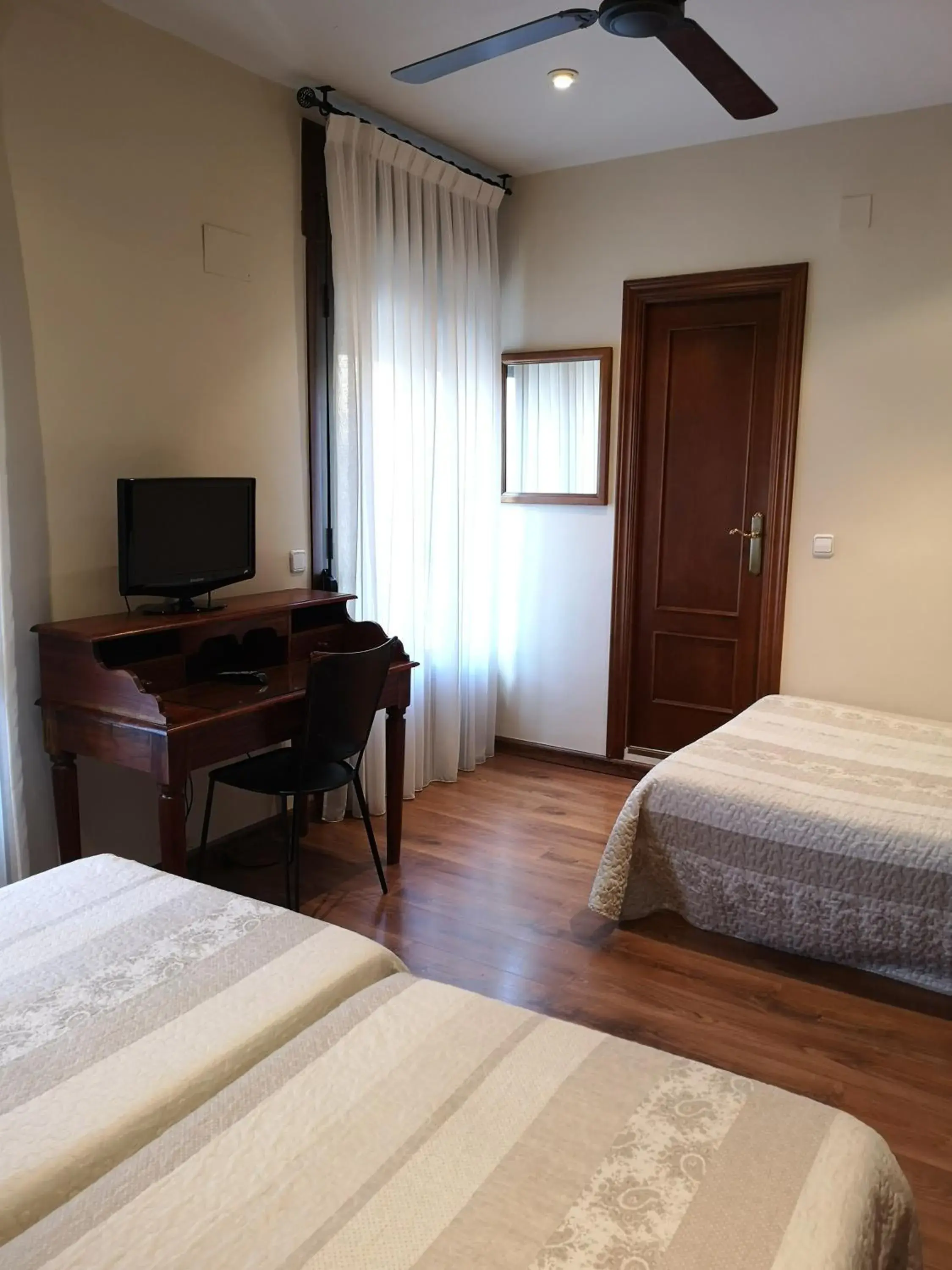 Quadruple Room with Balcony in Hostal Plaza Quadruple Room with Balcony in Hostal Plaza