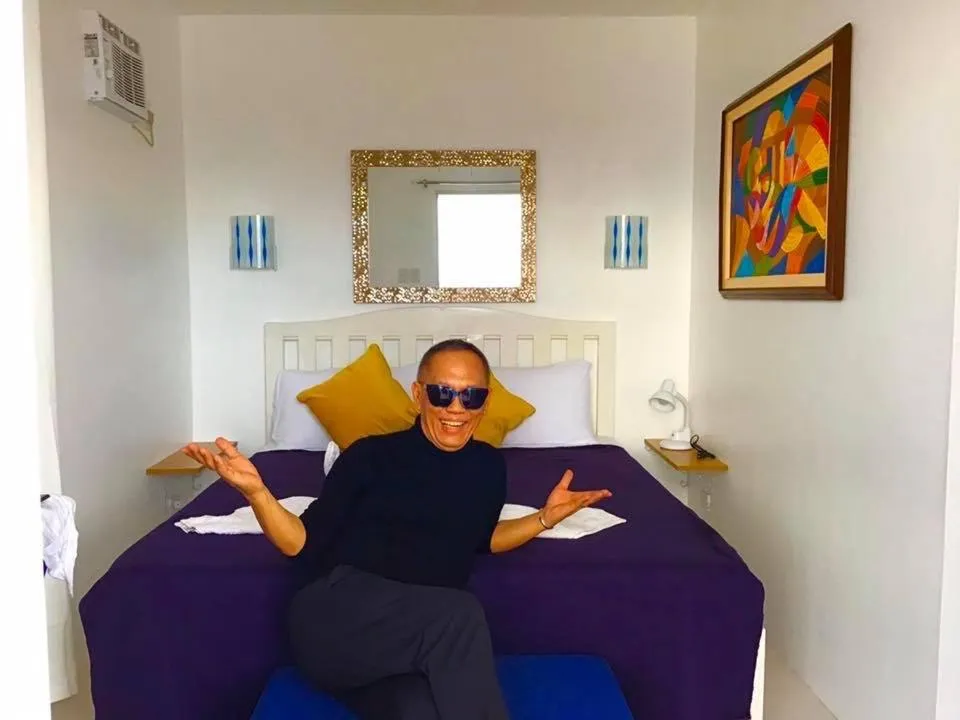 Bed in 1888 Beach Resort