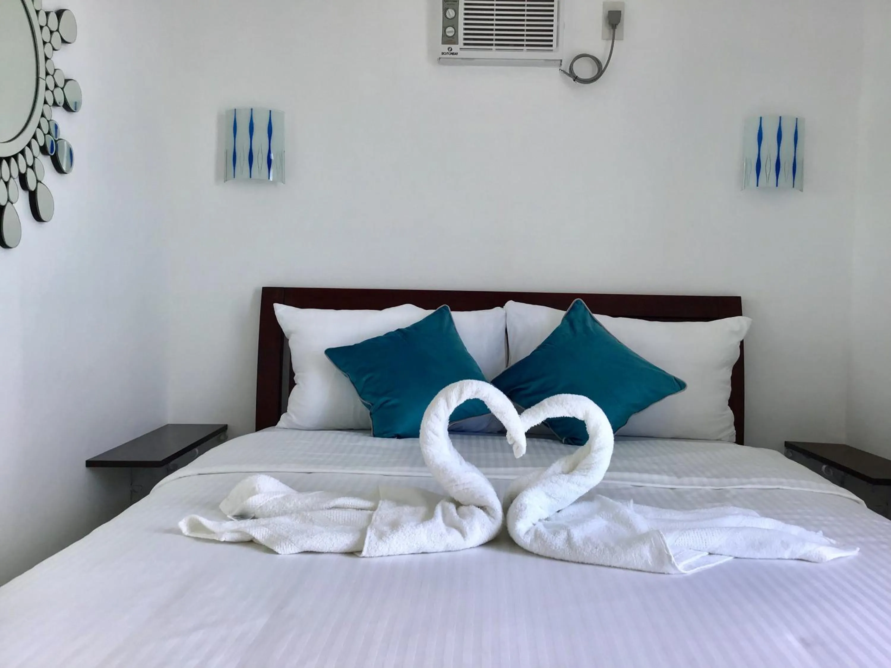 Bed in 1888 Beach Resort