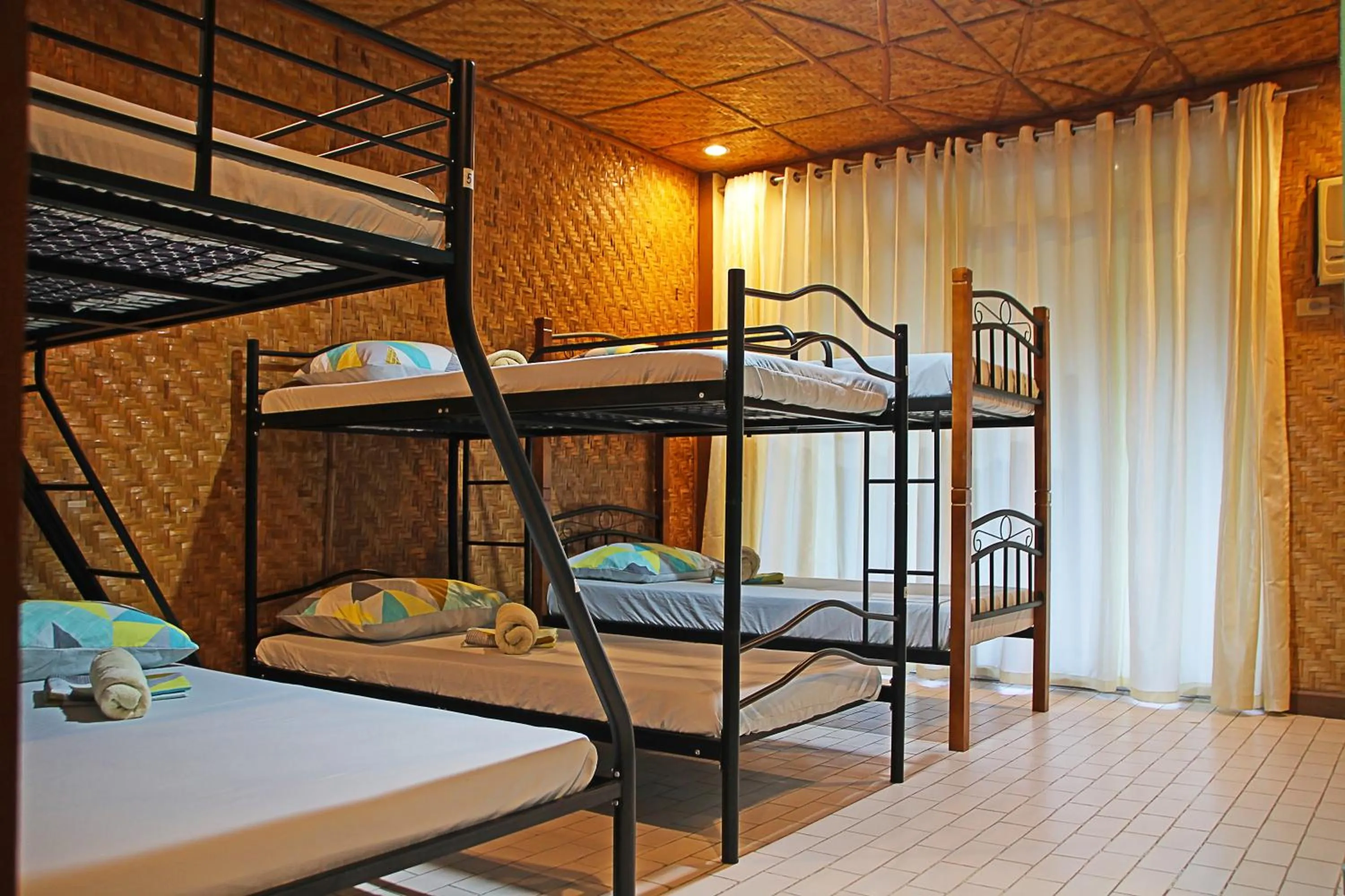 Bed in 1888 Beach Resort