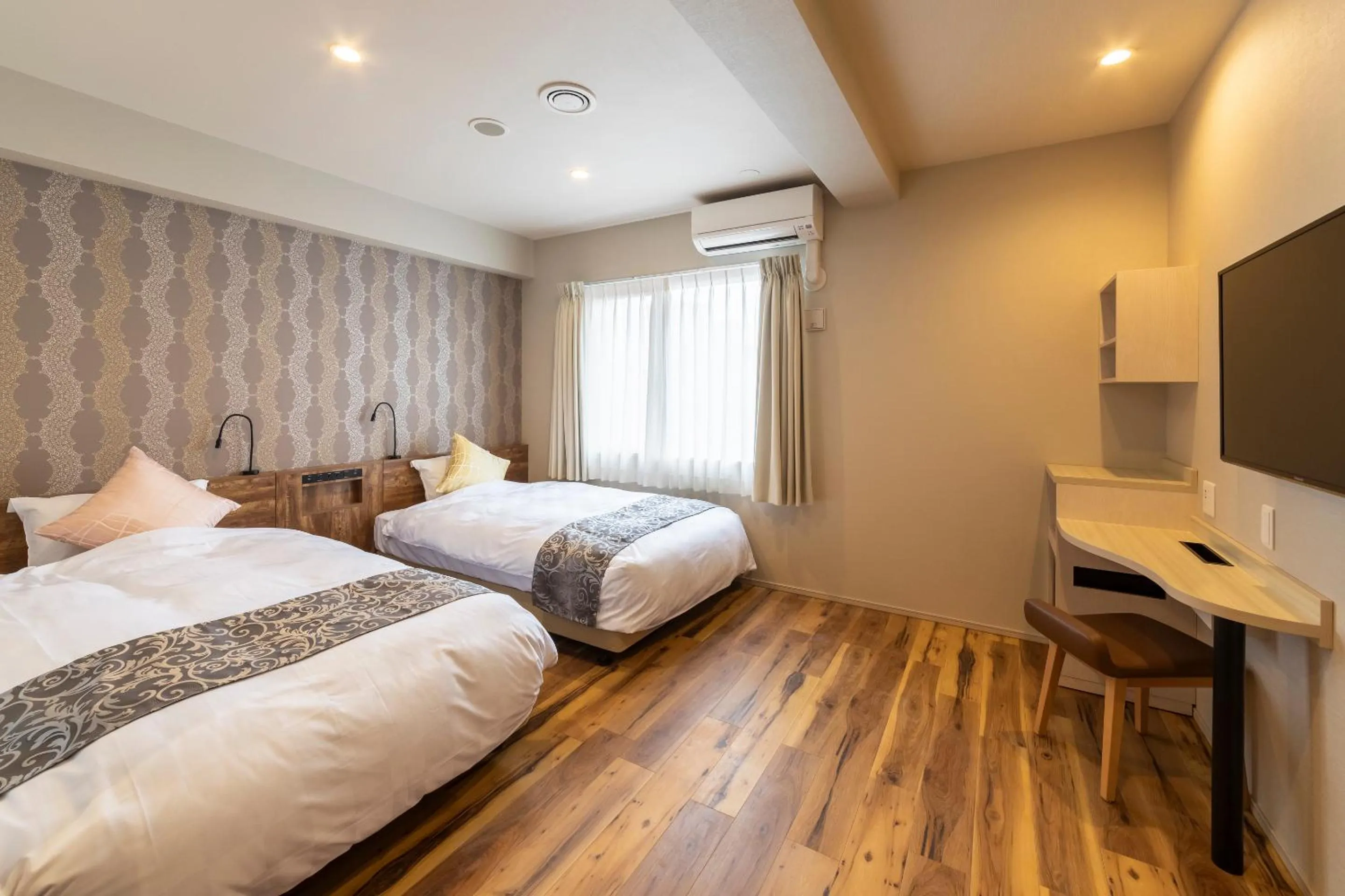 Bed in SARASA HOTEL Dotonbori