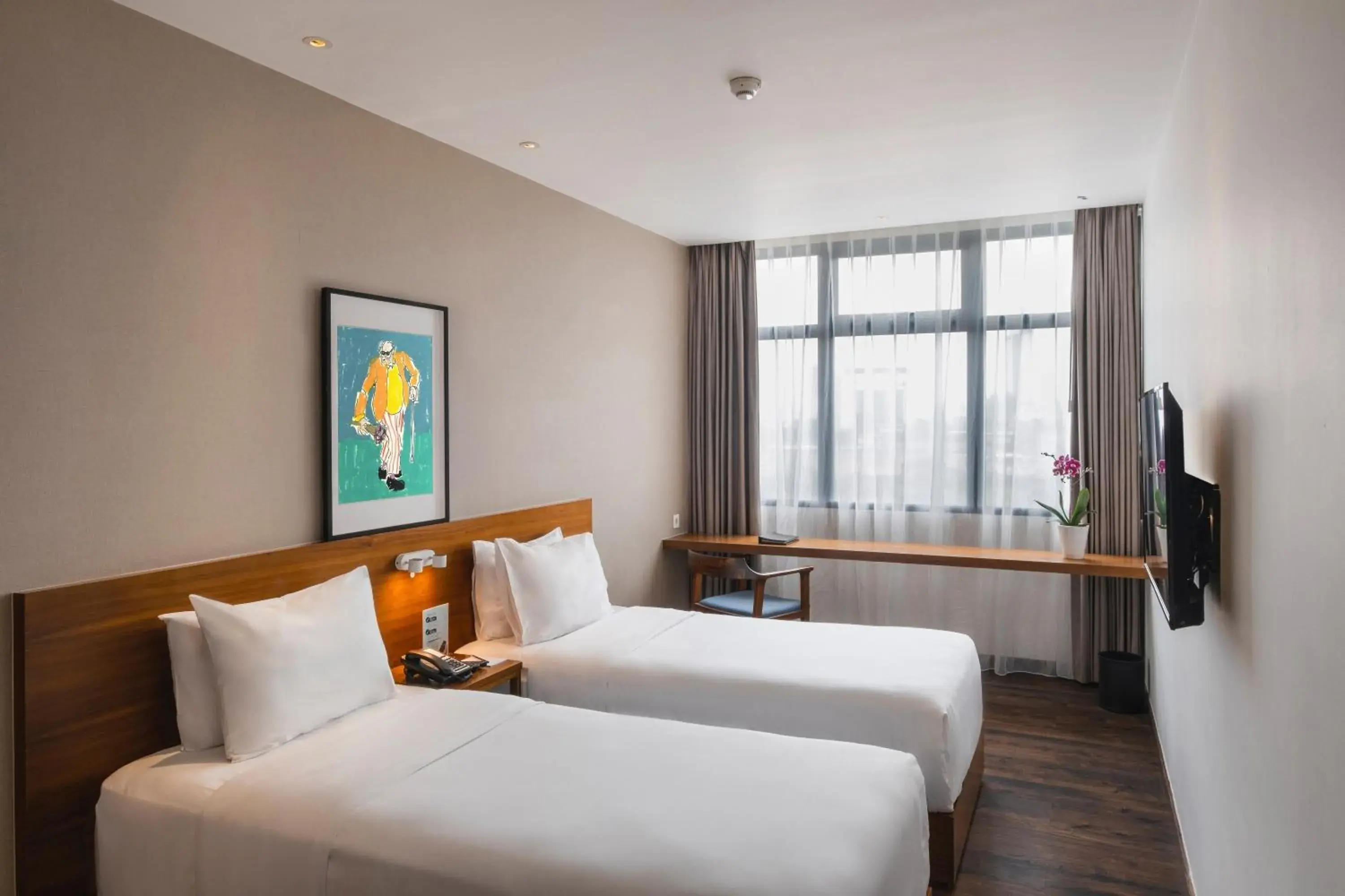 Deluxe Twin Room in Veranda Serviced Residence Puri Deluxe Twin Room in Veranda Serviced Residence Puri