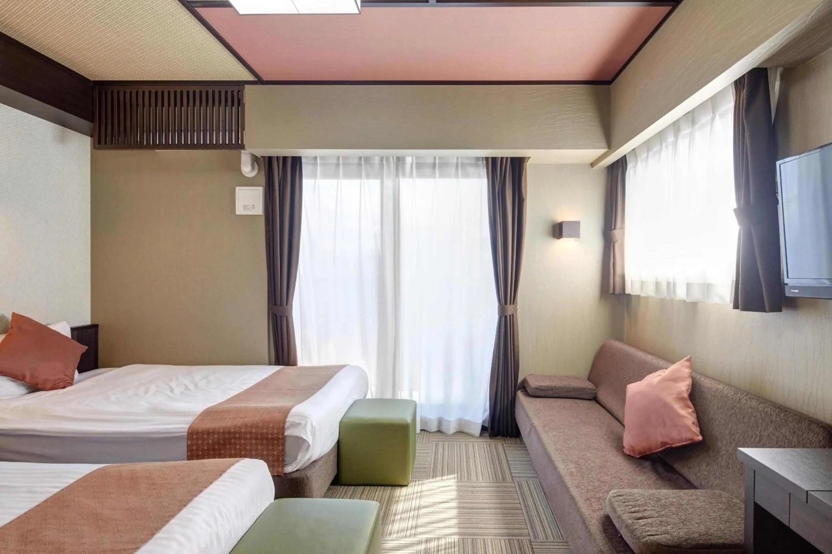 Living room, Bed in Hotel Amaterrace Nippombashi-higashi