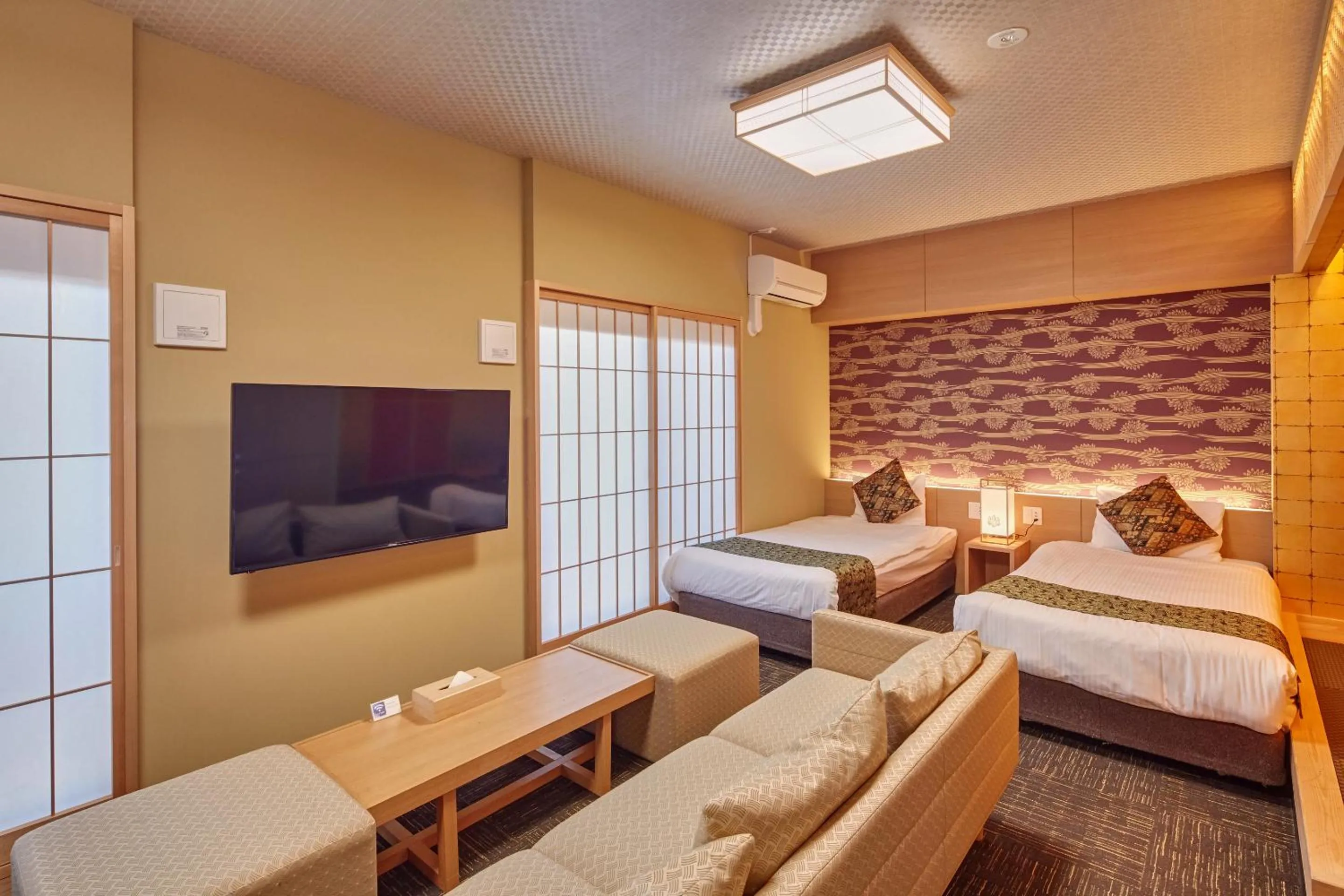 Living room, Bed in Hotel Amaterrace Nippombashi-higashi