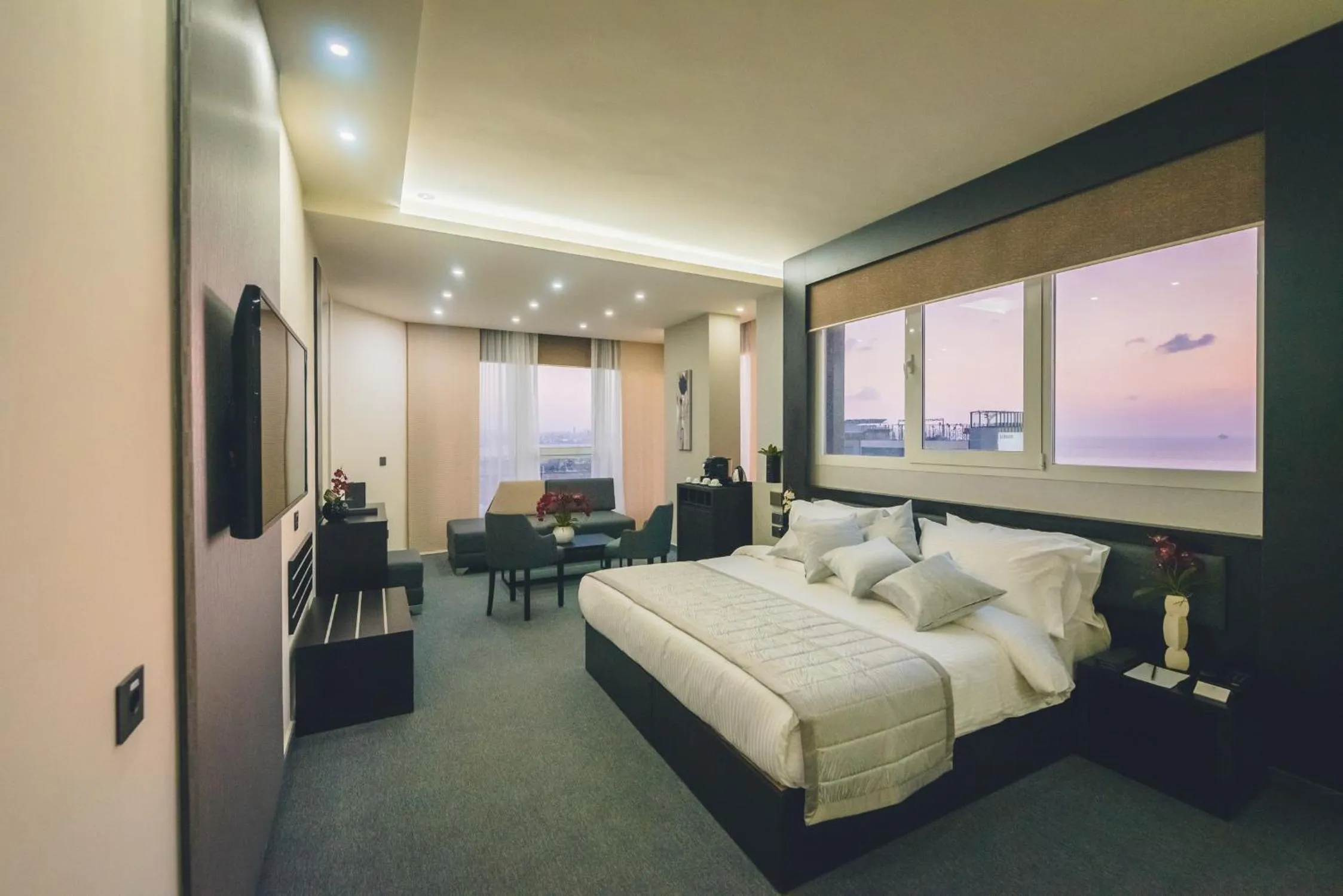 Photo of the whole room, Bed in Louis V Hotel Beirut