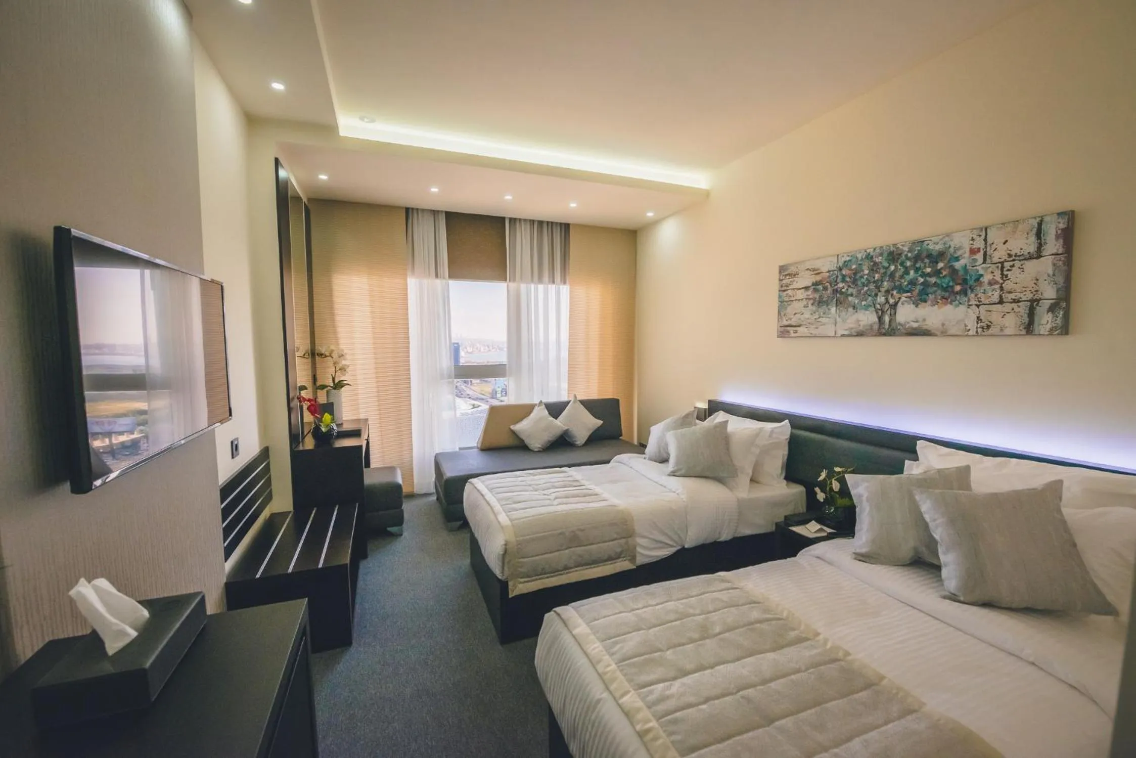 Seating area, Bed in Louis V Hotel Beirut