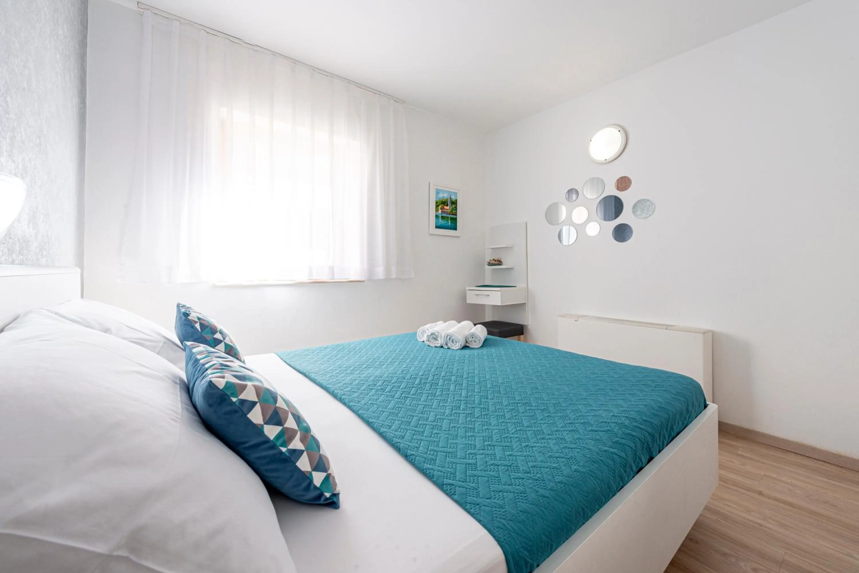 Bedroom in Cina Apartments