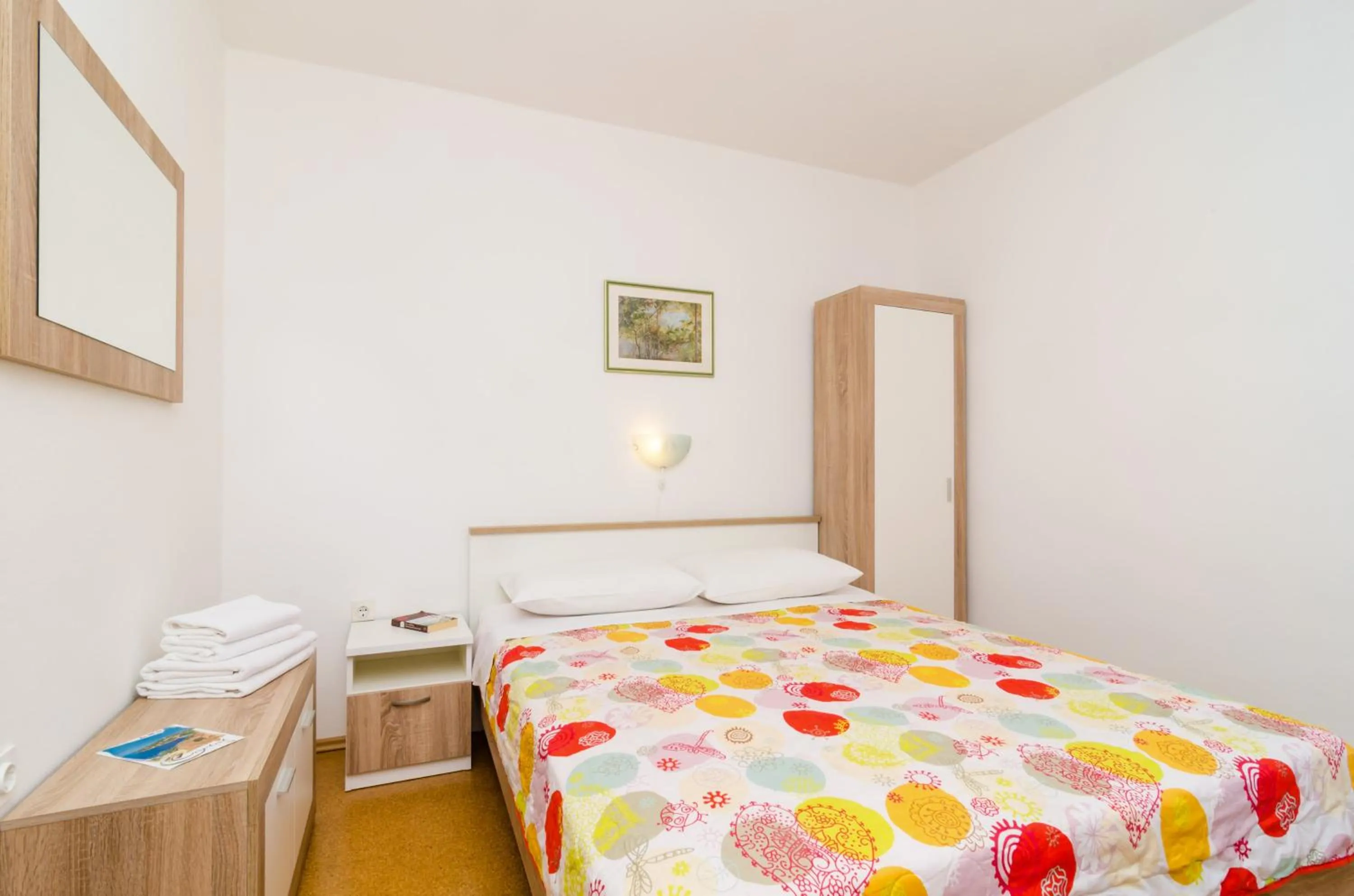 Bed in Cina Apartments